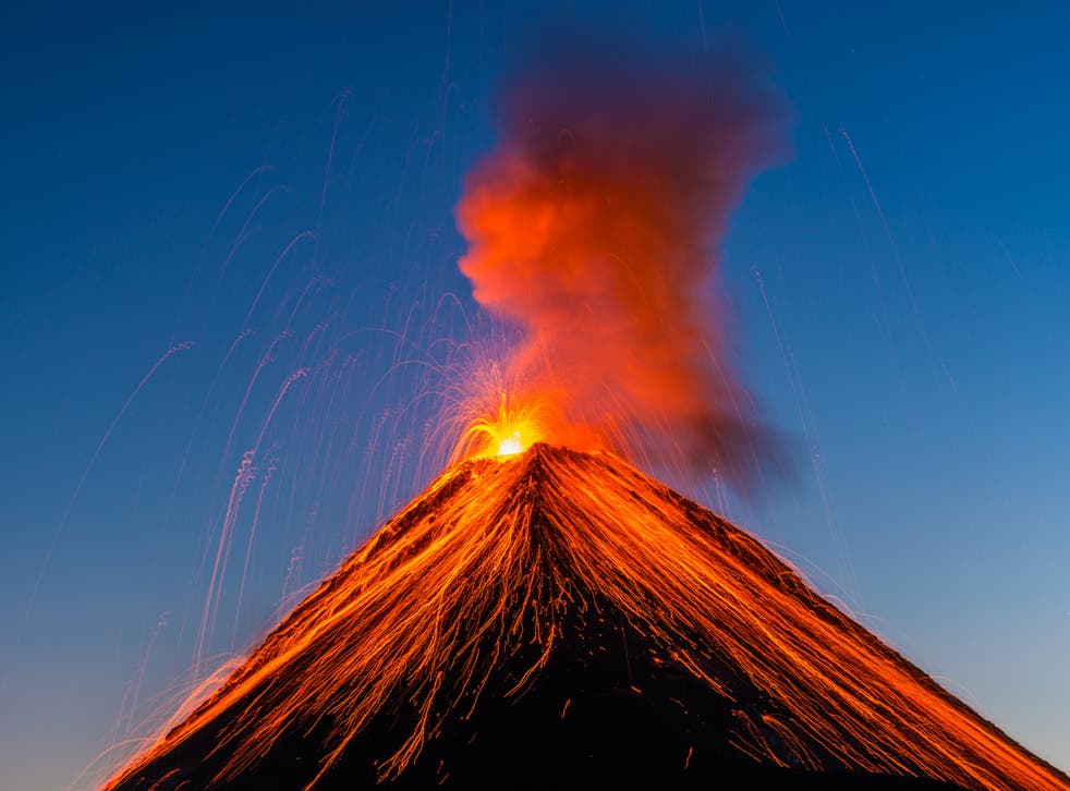 <p>The Fuego volcano in Guatemala erupting in 2016. The impact of huge volcanic eruptions is underestimated, scientists have warned</p>