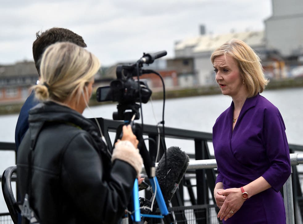 Liz Truss talking to the media during a campaign visit to the maritime engineering company in Belfast Harbour, as part of her campaign to be leader of the Conservative Party and the next prime minister (Clodagh Kilcoyne/PA)