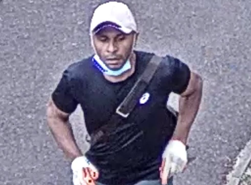 <p>Handout CCTV image issued by the Metropolitan Police of a man wearing grey shorts, a dark coloured t-shirt, a white baseball cap and white patterned builder style gloves, and armed with a knife</p>