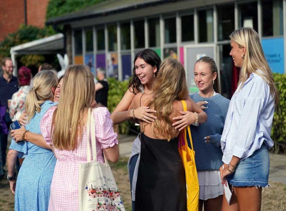 Hugs all around at Norwich School (Joe Giddens / PA)