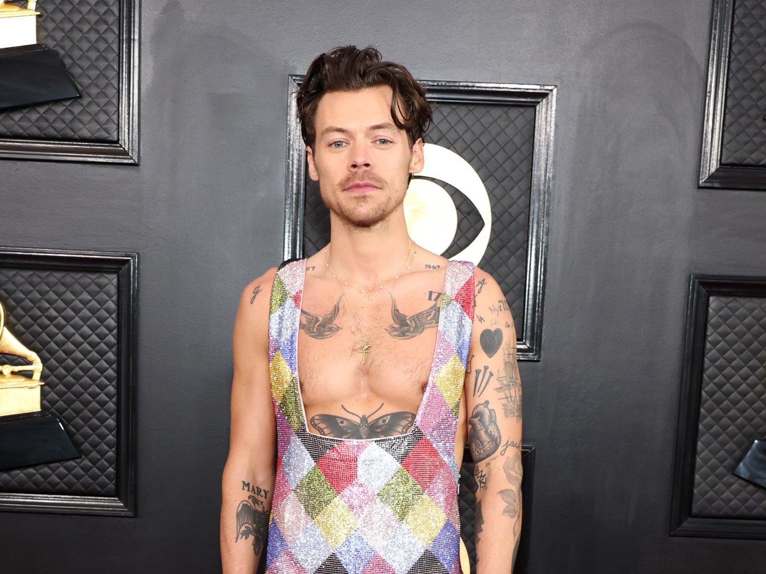 Harry Styles Goes Bare Chested In Rainbow Jumpsuit At Grammys