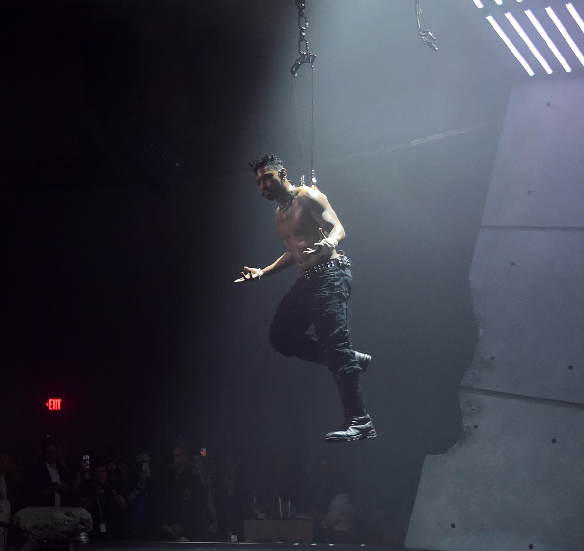 Miguel suspends himself from piercings on his back in insane stunt to announce new album Miguel suspends himself from piercings on his back in insane stunt to announce new album