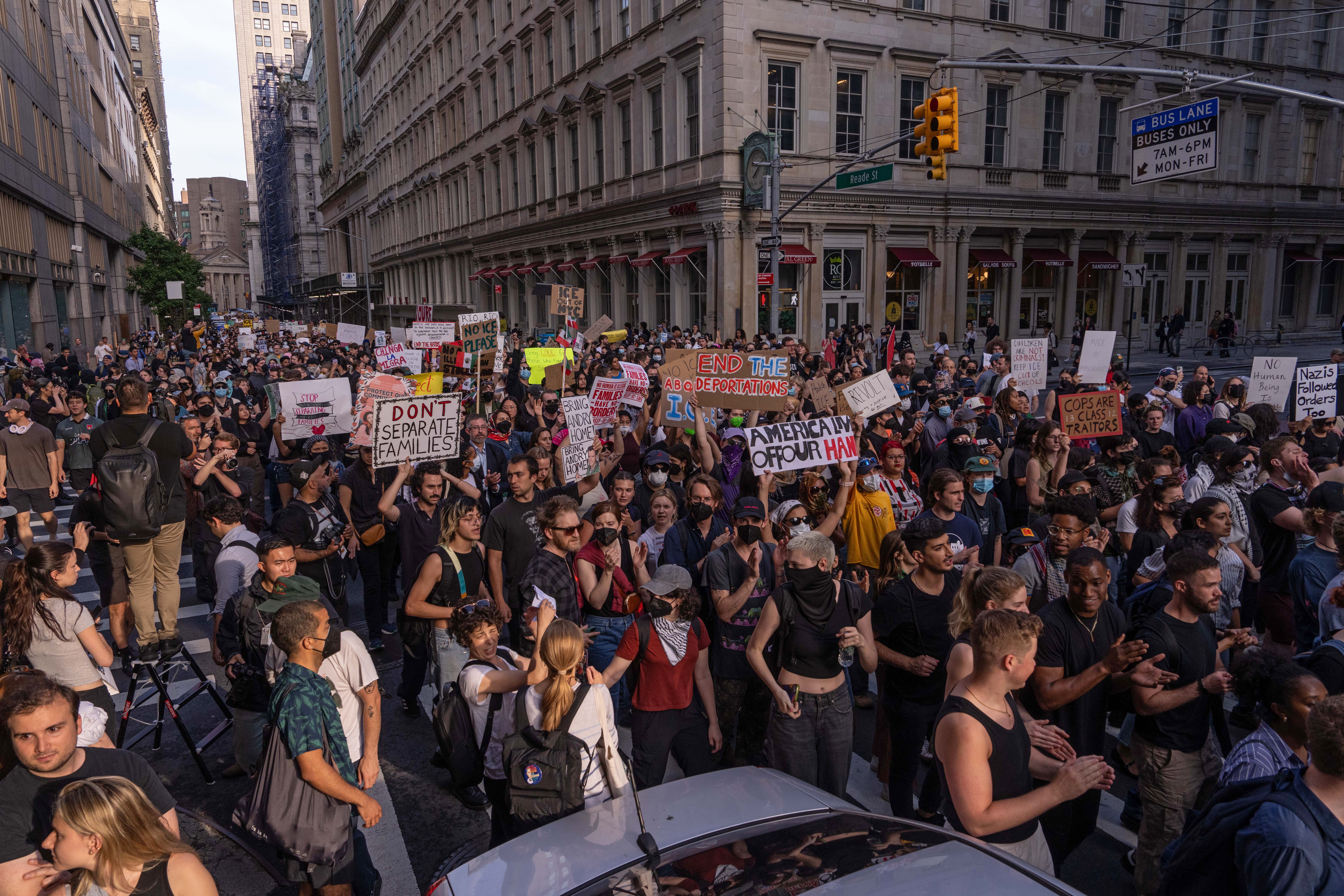 People march during a protest against deportations and ICE on Tuesday in New York City