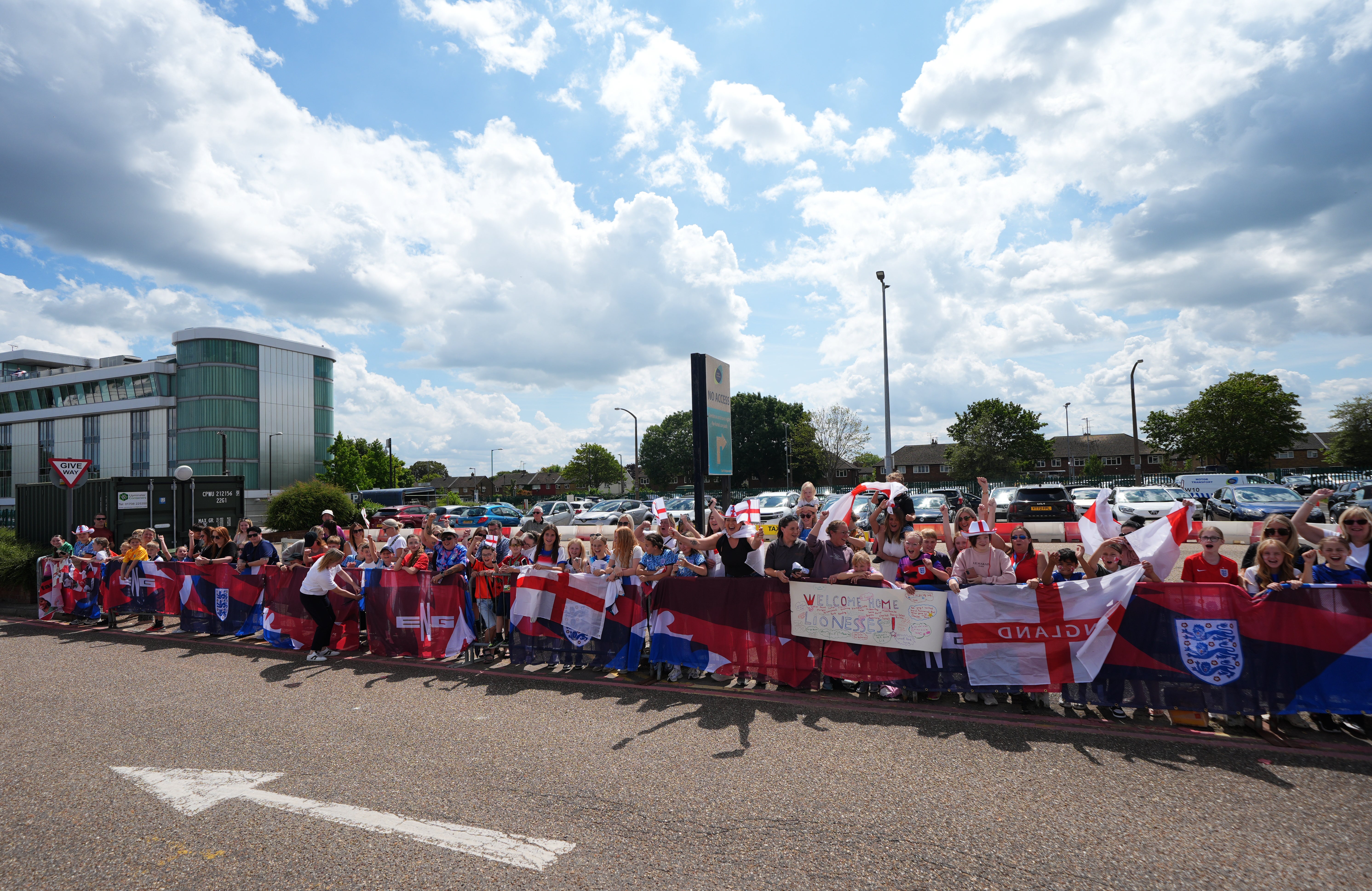 England fans waiting outside London Southend Airport for the England team to arrive