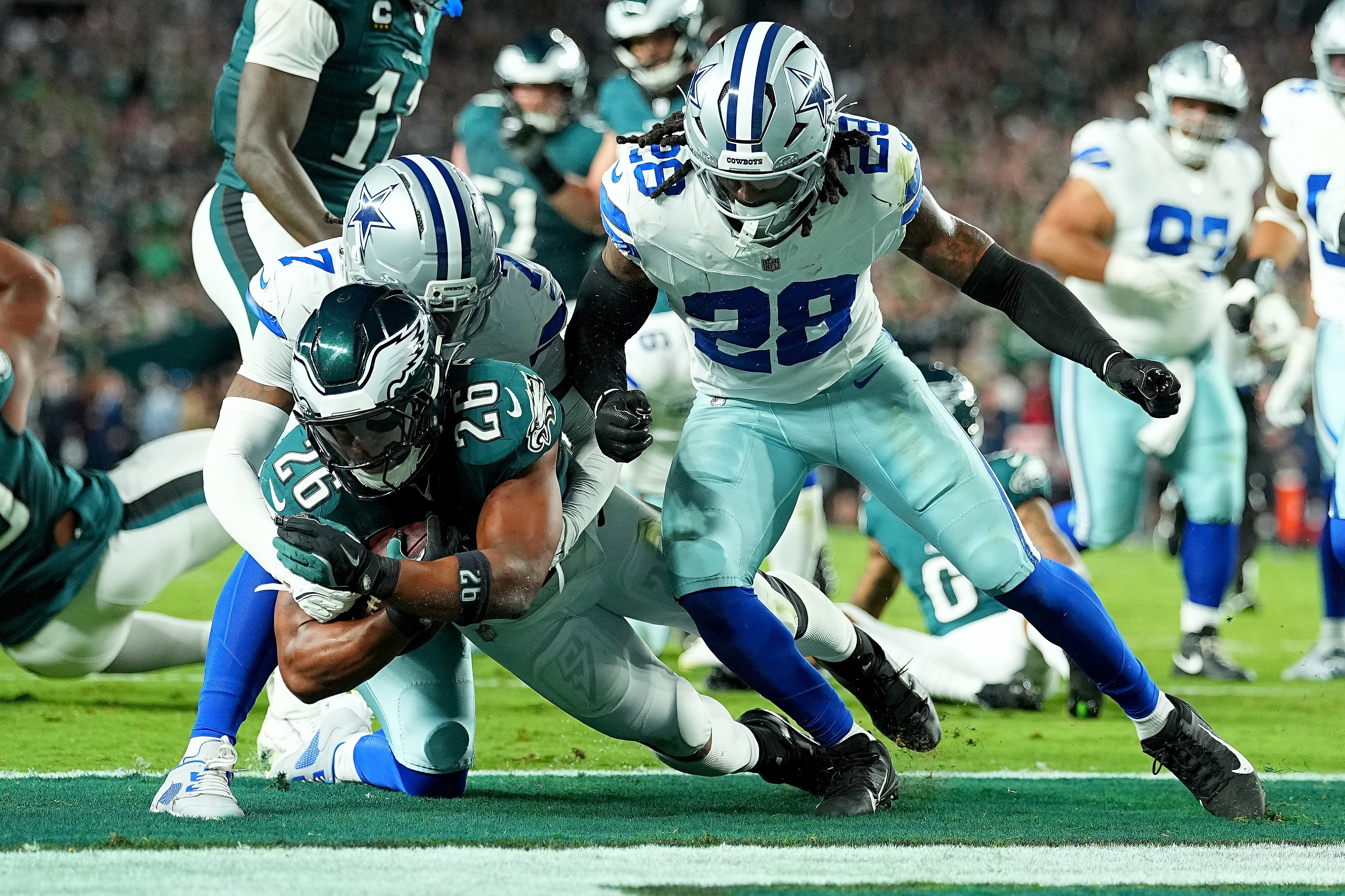 Eagles' Saquon Barkley scores a touchdown in their victory over the Dallas Cowboys