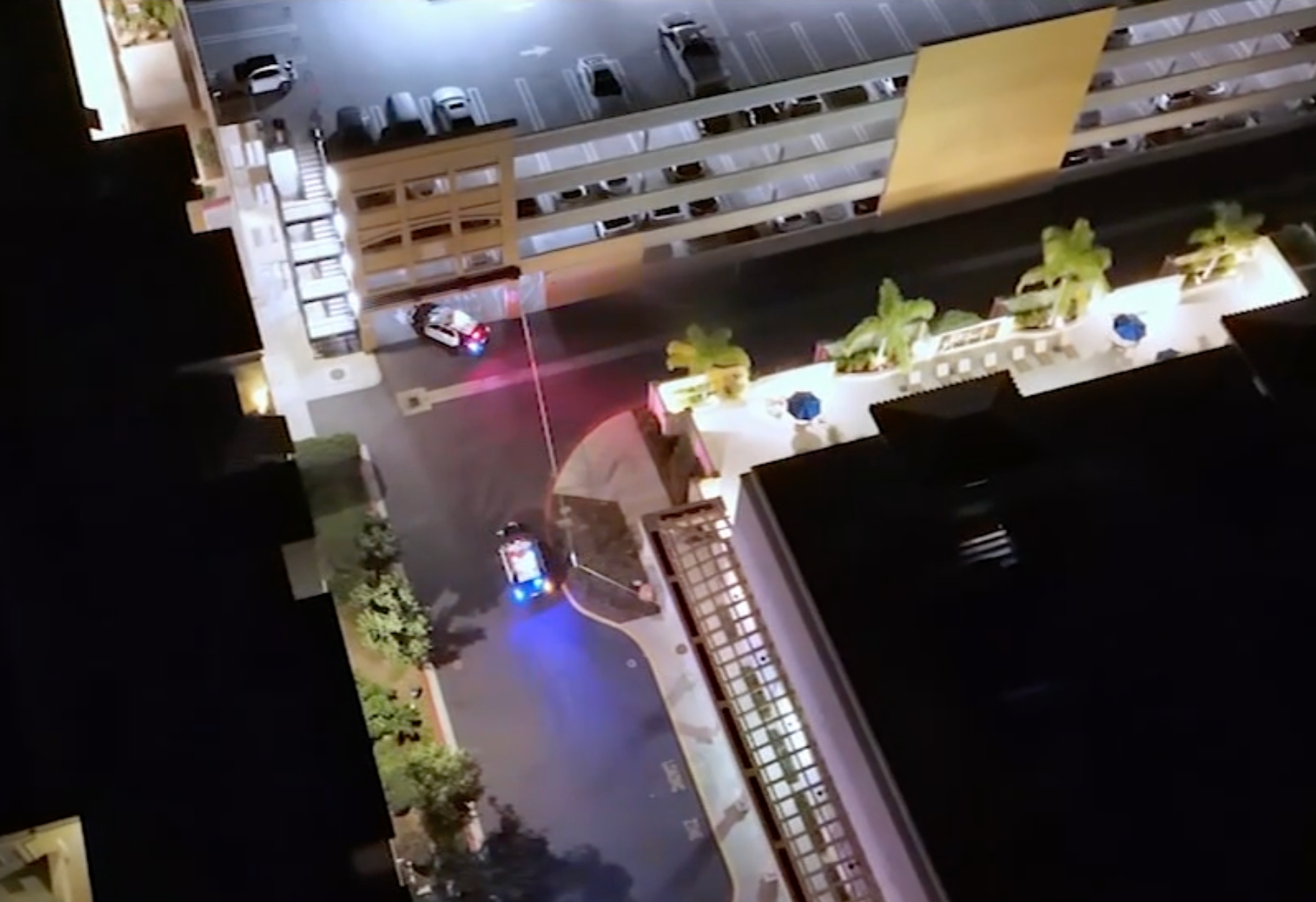 Police at the parking garage in the Town Center area of Valencia, California, where the body of Carrie Elizabeth Romney was discovered on Friday October 10 2025