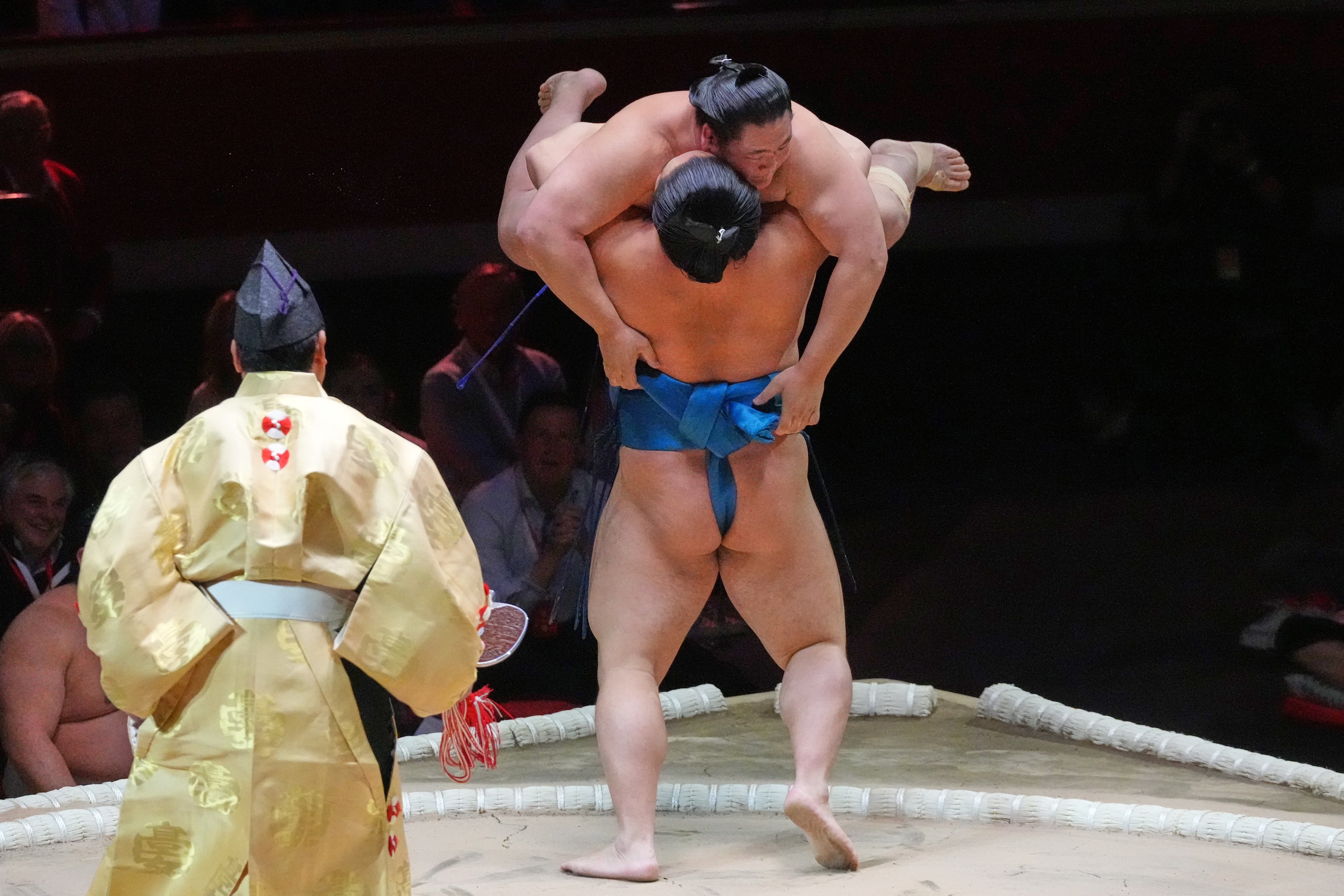 One method of winning is to lift and dump an opponent outside of the rope
