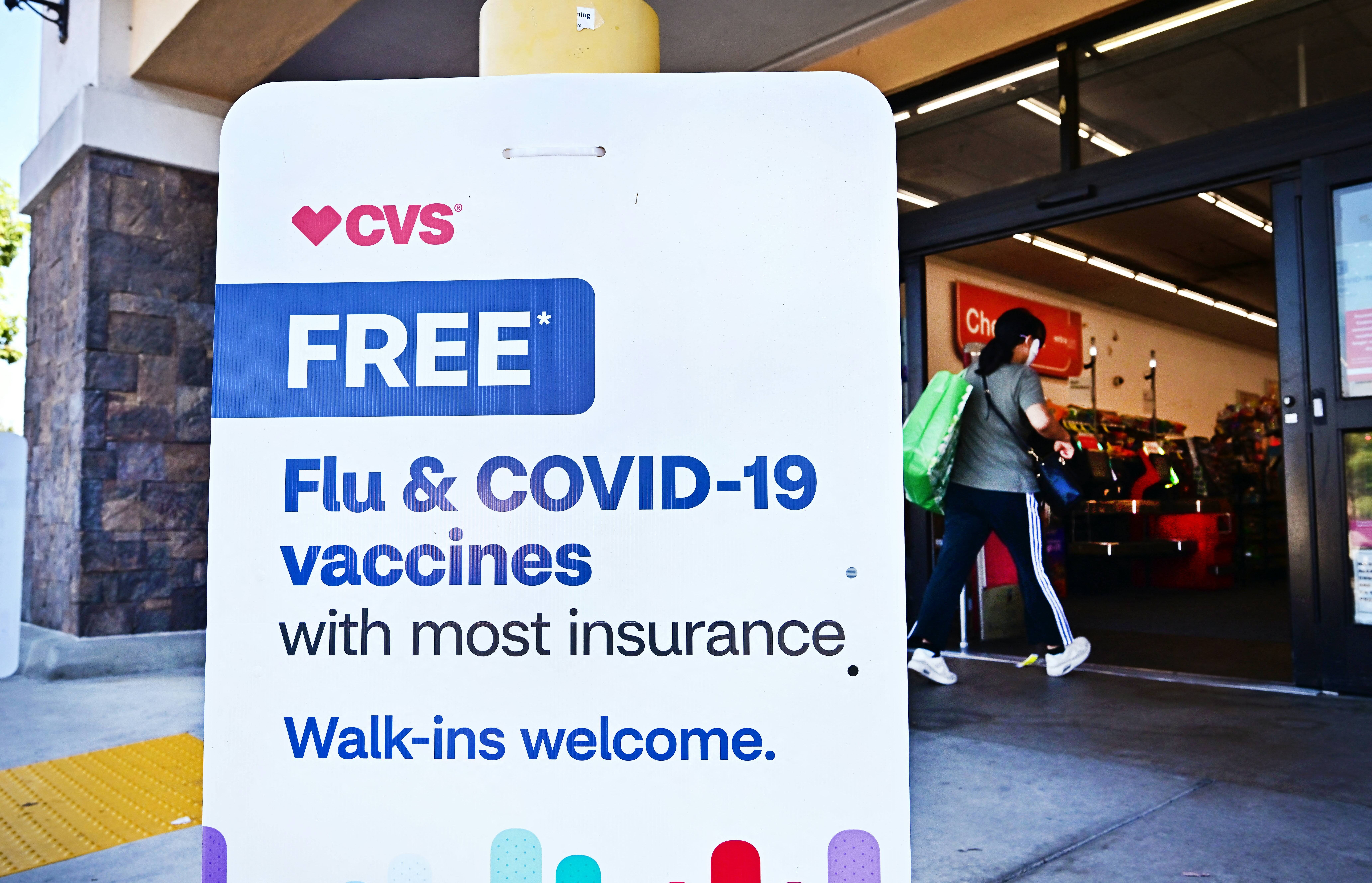 Doctors say getting vaccinated against the flu and Covid can help prevent severe infection, even if breakthroughs occur