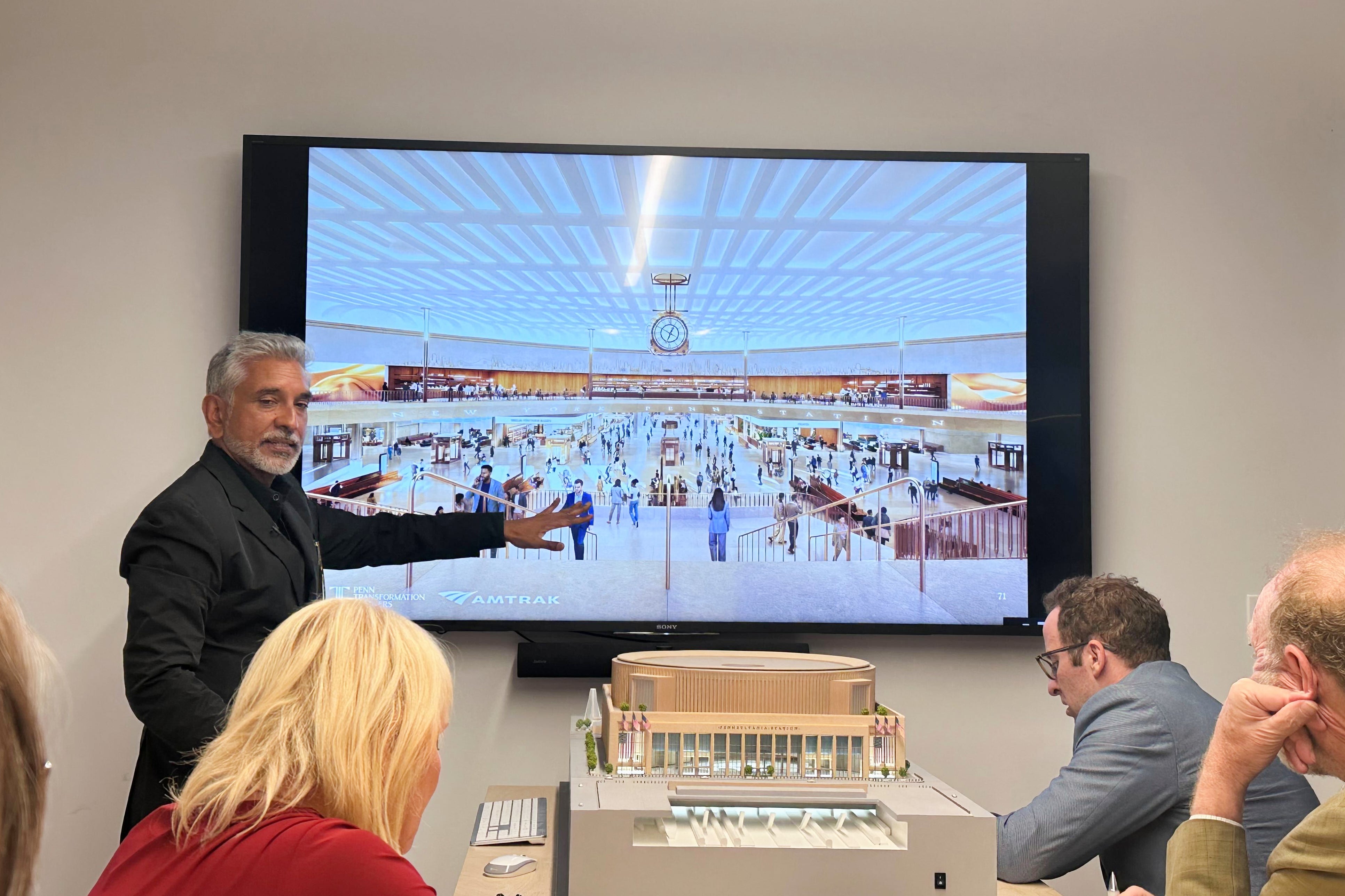 Vishaan Chakrabarti, one of the leaders of the team awarded the project to dramatically redesign New York City's Penn Station, presents architectural designs during a presentation Monday, June 8