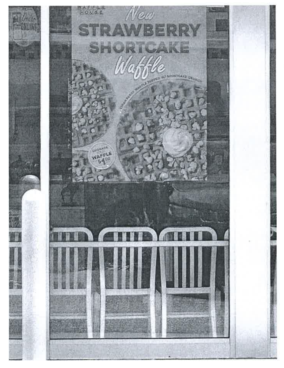 Edward Bowlds was distracted by an ad for a limited-edition Strawberry Shortcake Waffle and severely injured himself when he tripped over an elevated curb, according to court filings
