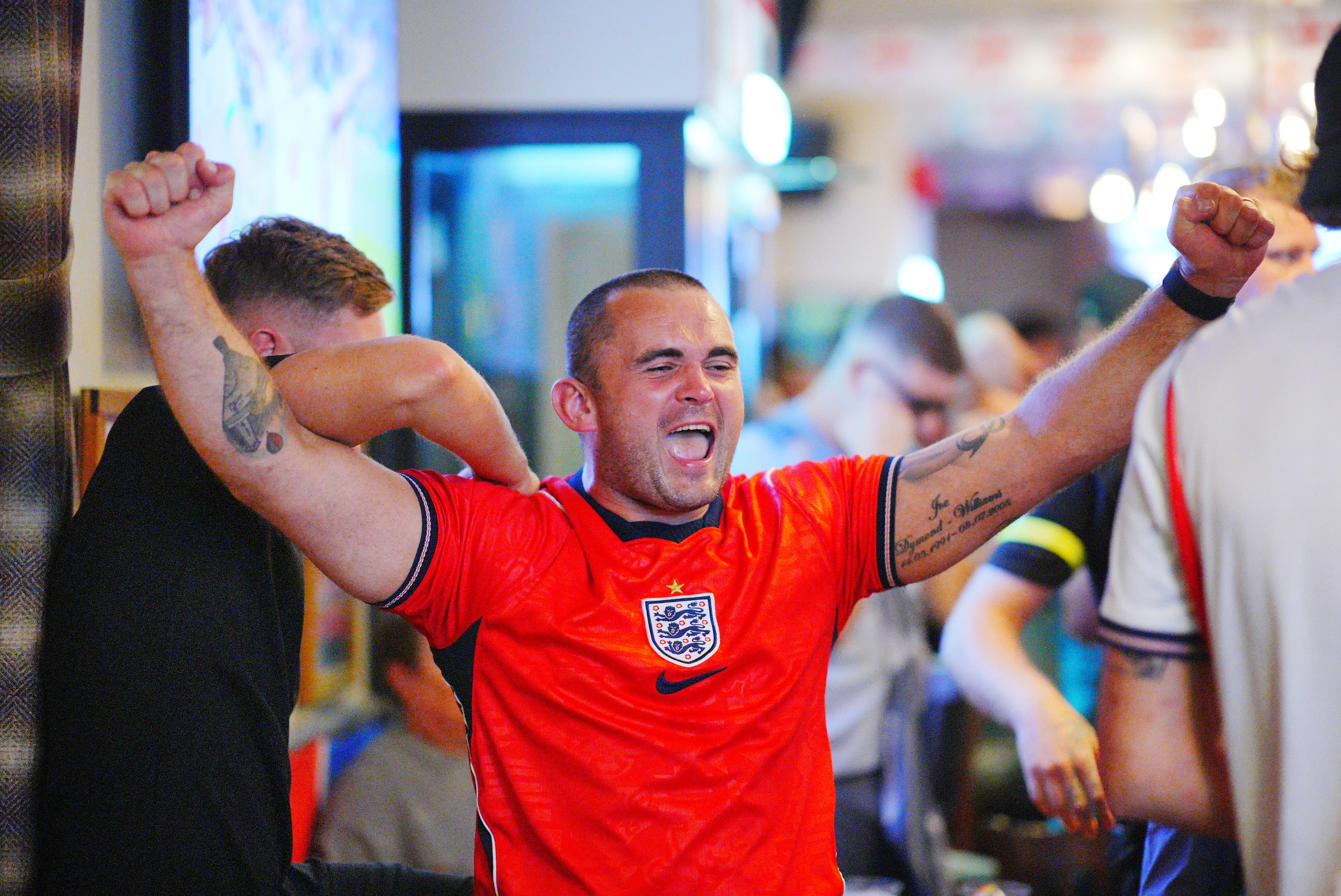 Fans celebrate Jude Bellingham’s first goal (Ben Birchall/PA)
