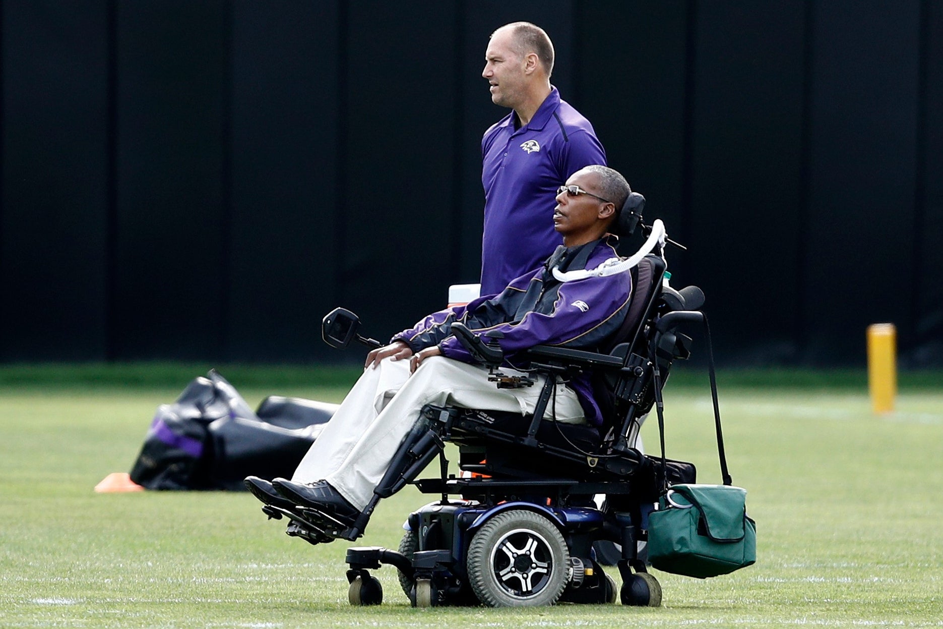O.J. Brigance watches an NFL football training camp practice in 2017