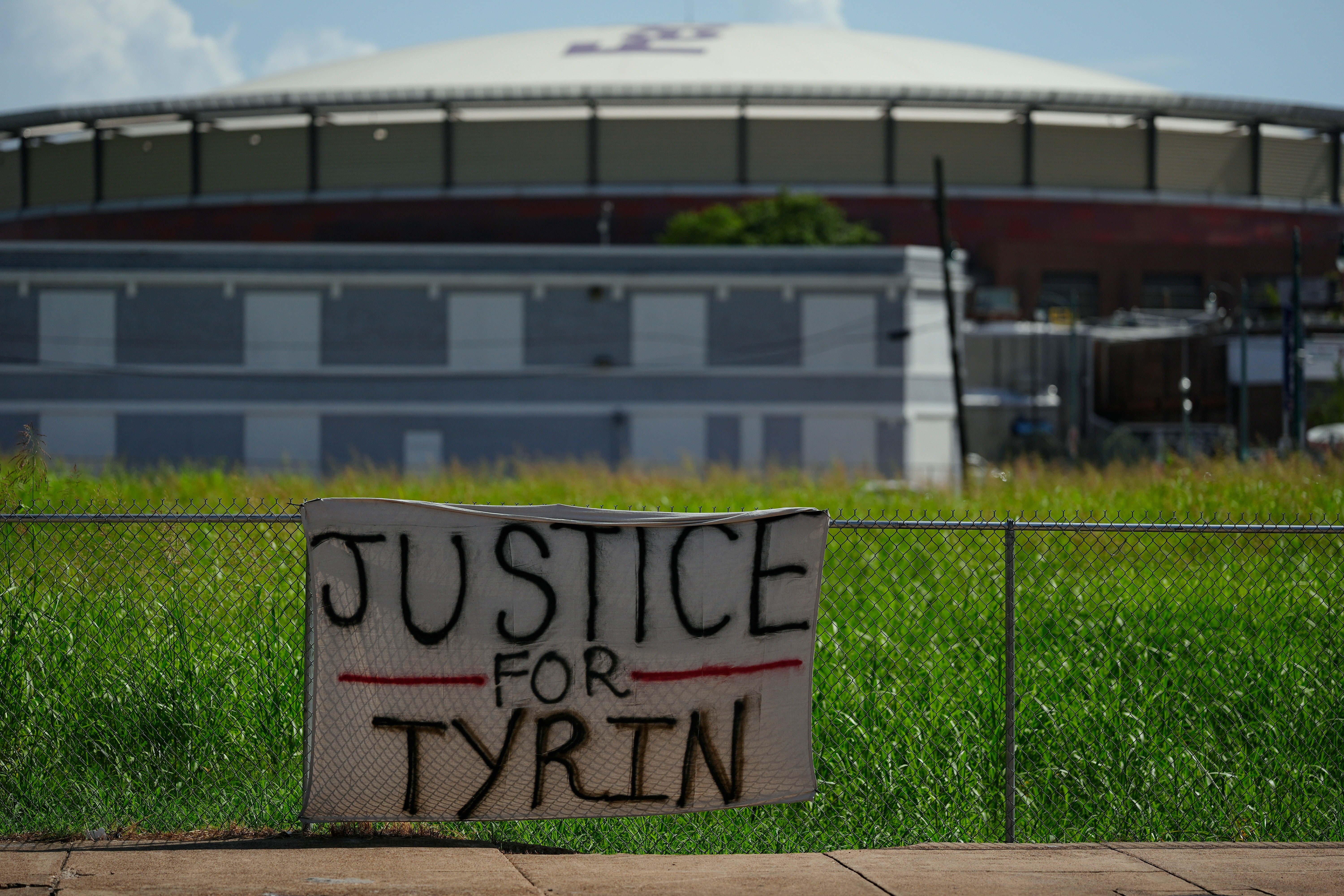 A banner for shooting victim Tyrin Johnson is seen near the corner of Union Ave. and Fourth Street in Tennessee