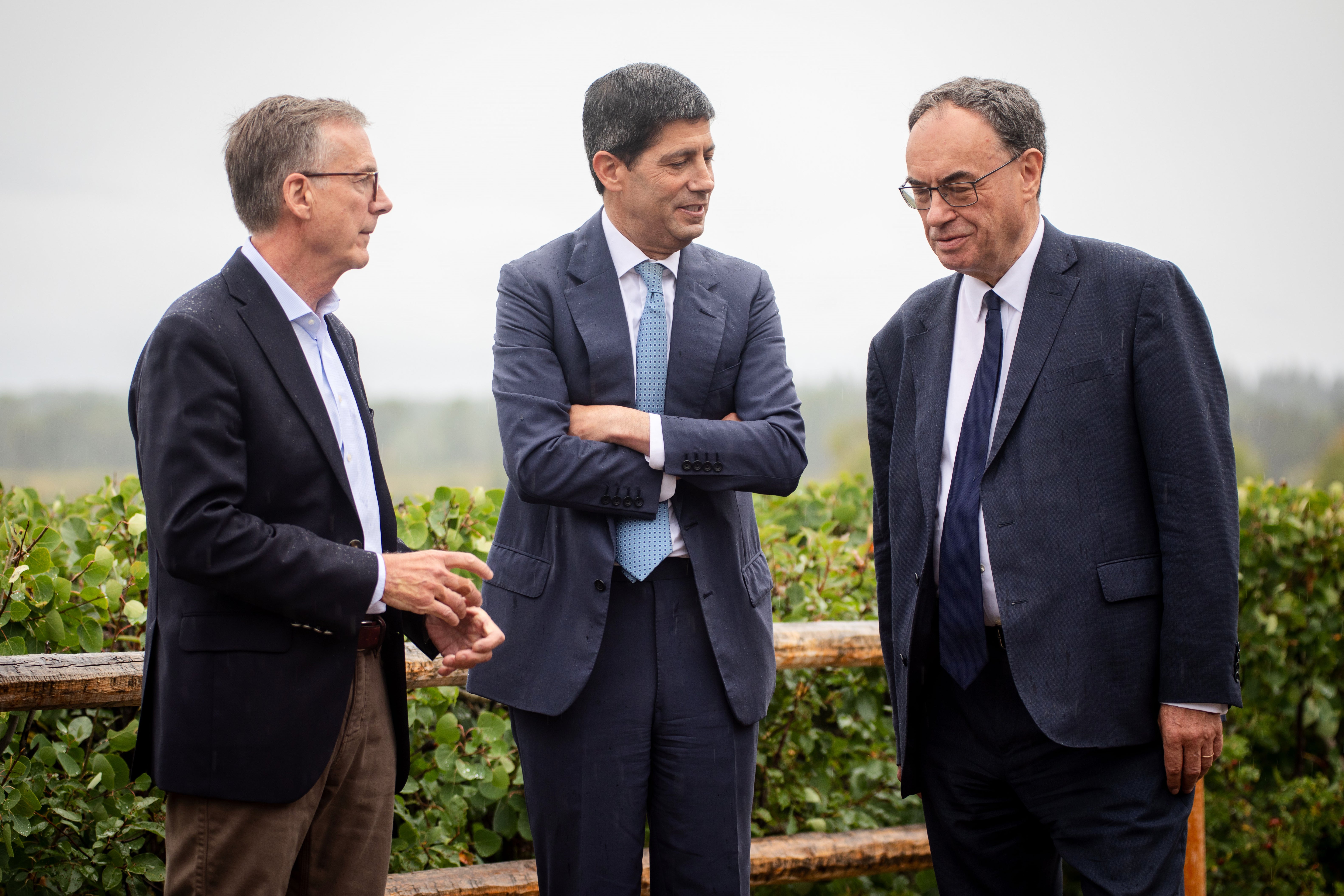 Fed Chair Kevin Warsh, center, talks to Bank of England Governor Andrew Bailey, right, and Bank of Canada Governor Tiff Macklem