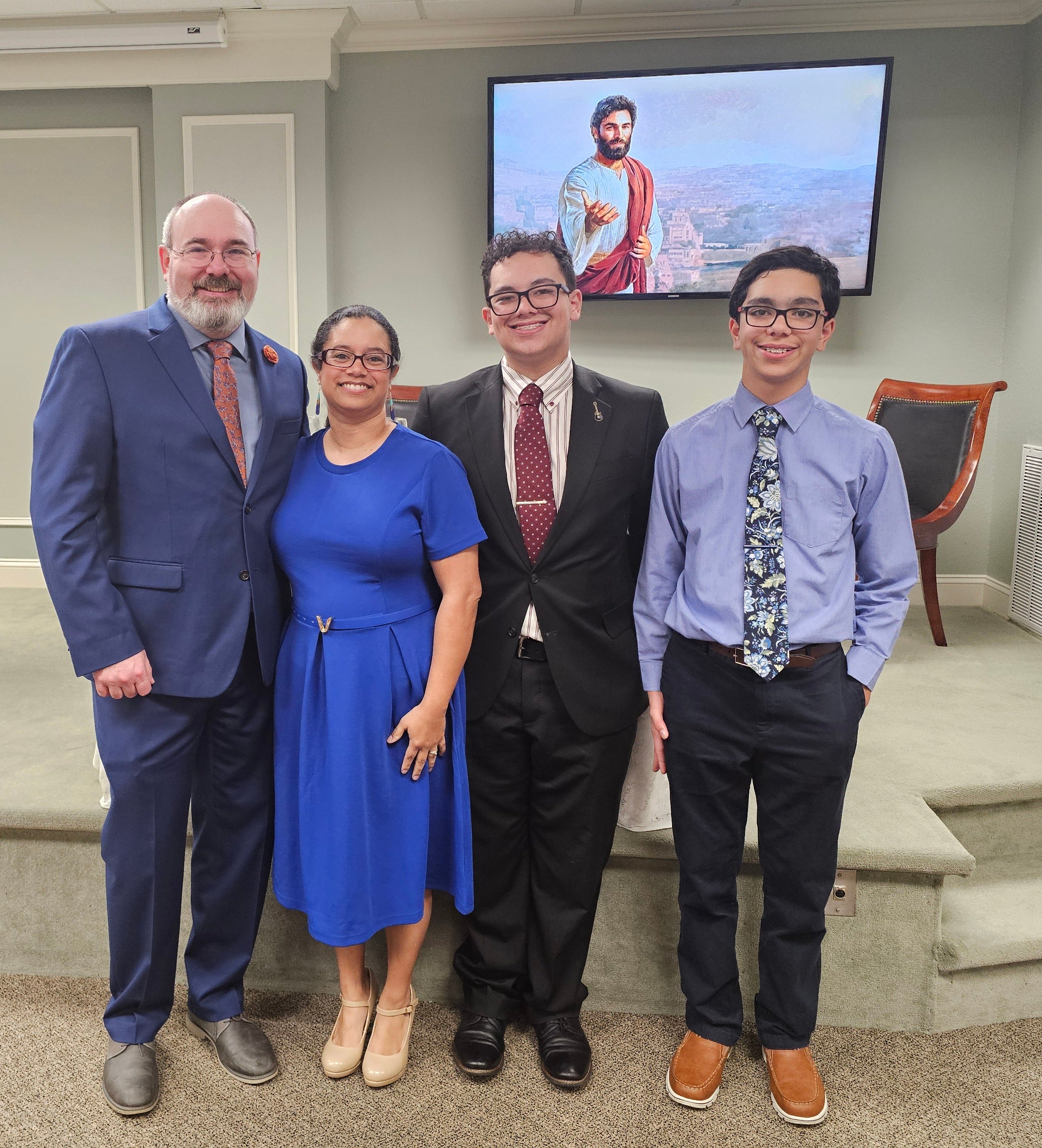 McLamb, left, now lives with his family in Leland, North Carolina. He is pictured with his wife, Gina, and sons Gavin and Garrett McLamb