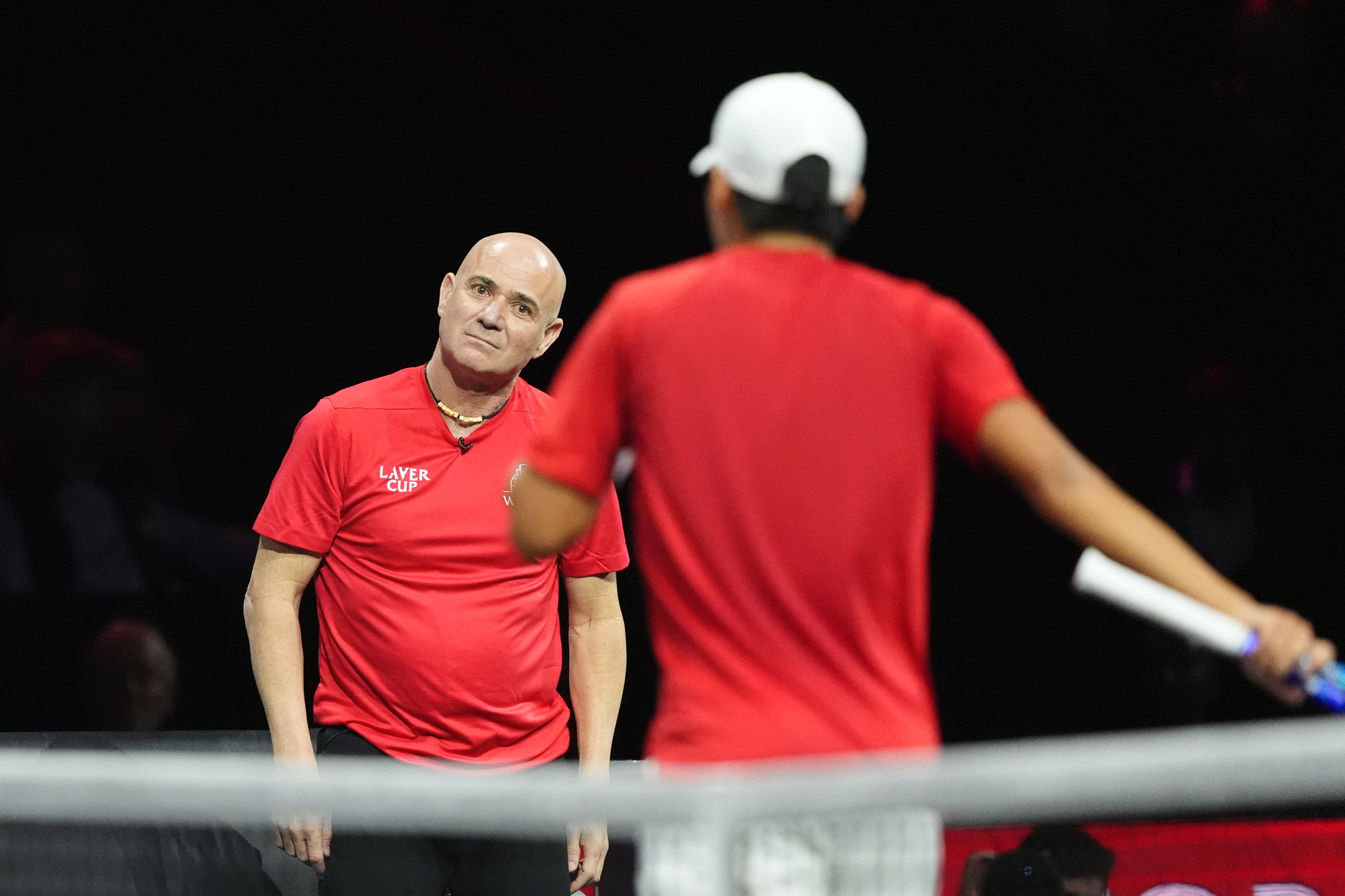 Team World captain Andre Agassi, left, reacts with Learner Tien (Adam Davy/PA)