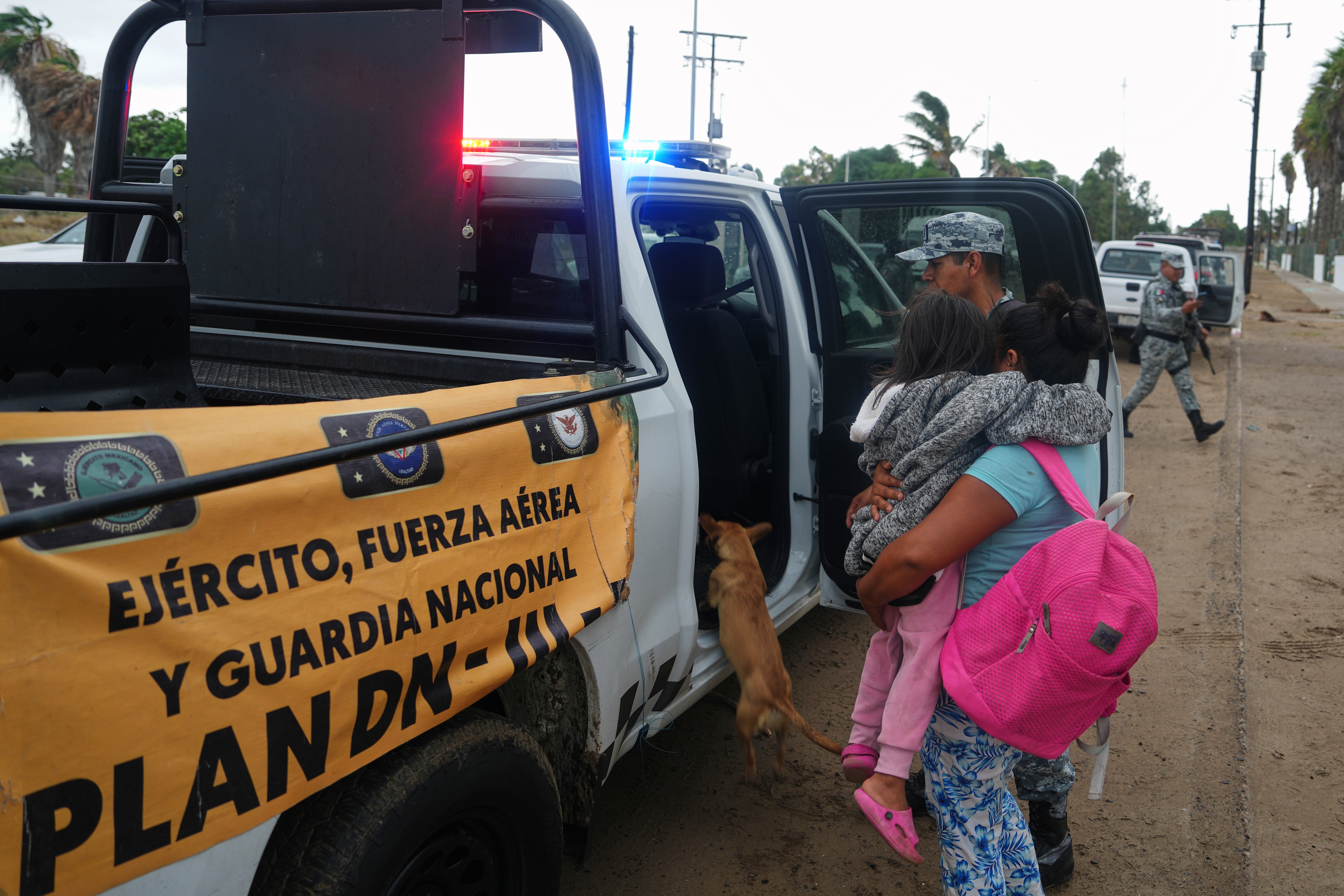 Residents are evacuated by the Army as Hurricane Polo approaches Puerto San Carlos