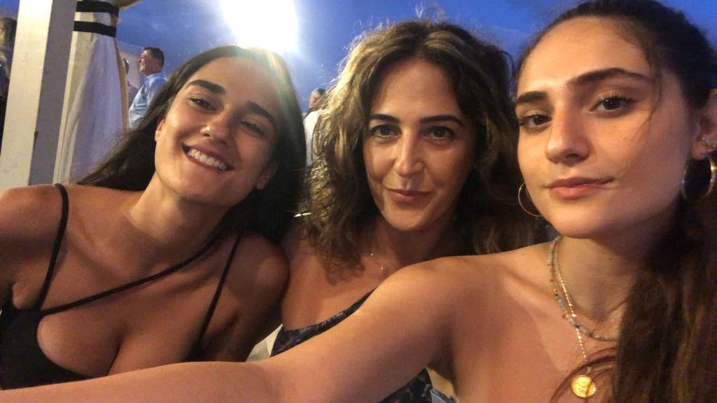 Sigal Manzuri (centre) with her daughters Norelle (left) and Roya (right) - both killed on October 7