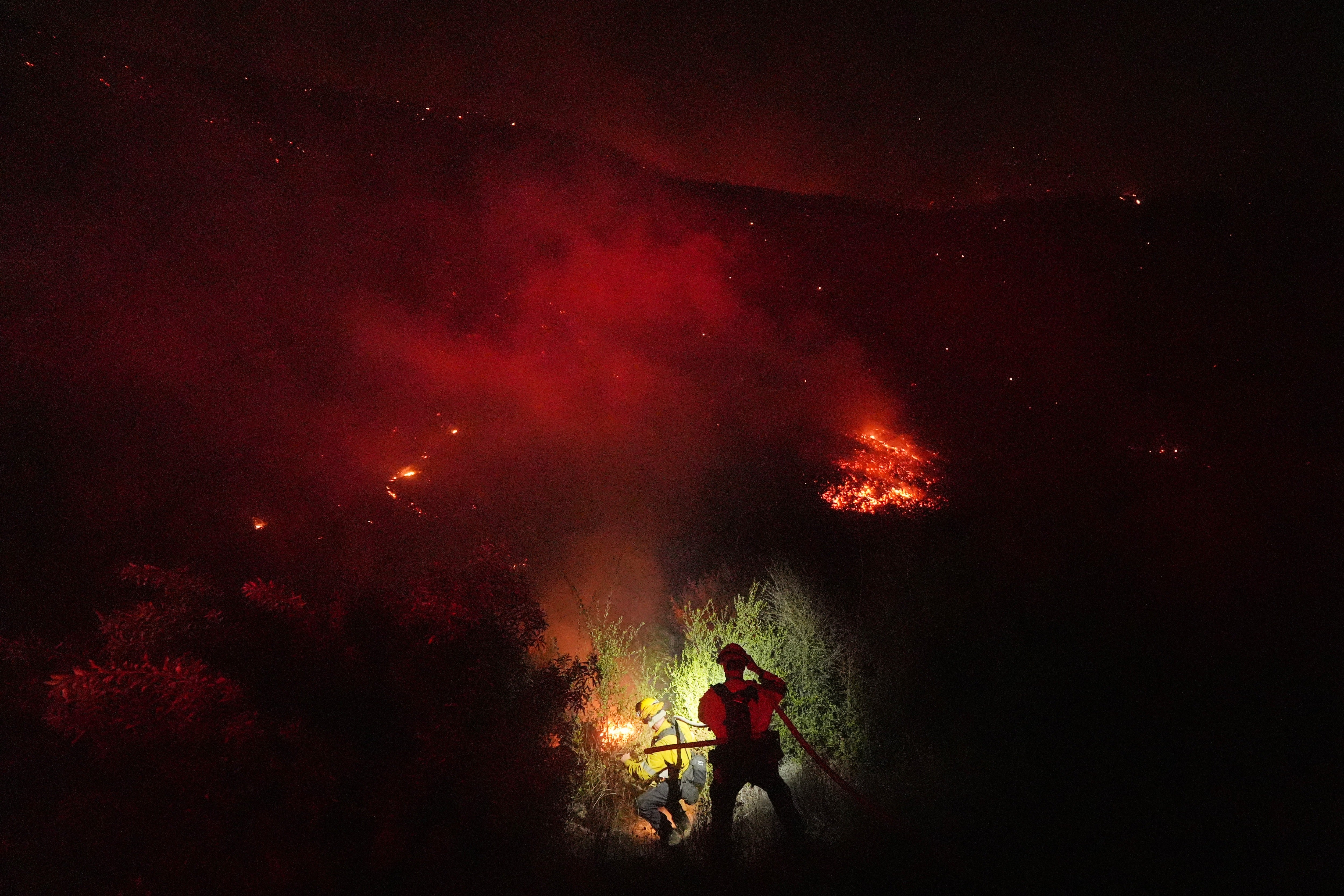 Crews make a stand in front of the Bryson Fire