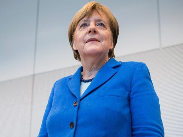 pg-26-merkel-epa.jpg