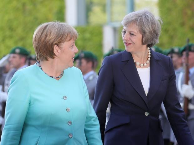 may-merkel-epa.jpg