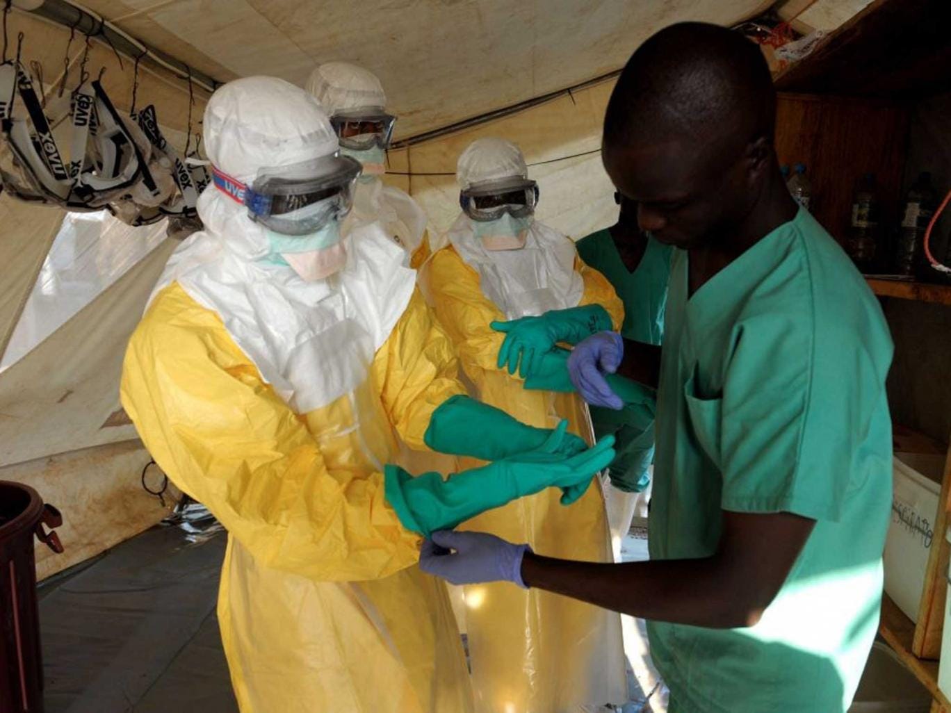 Suit Up: Ebola is spread by contact with bodily fluids,  so protection  is vital