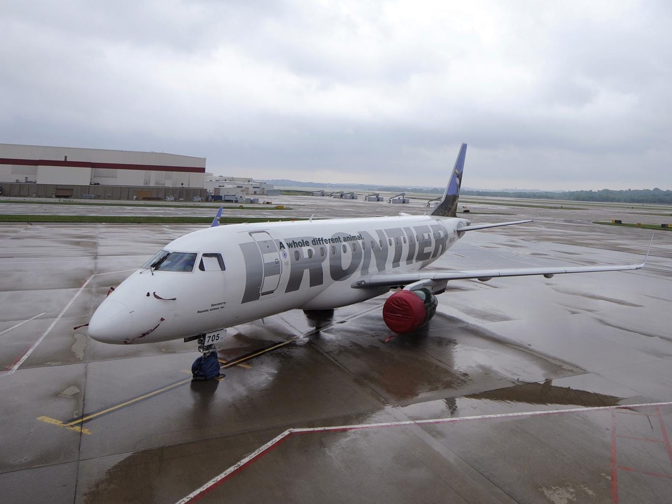  A Frontier Airlines plane sits on the tarmac at the Pittsburgh International Airport July 9, 2008 in Pittsburgh, Pennsylvania. 