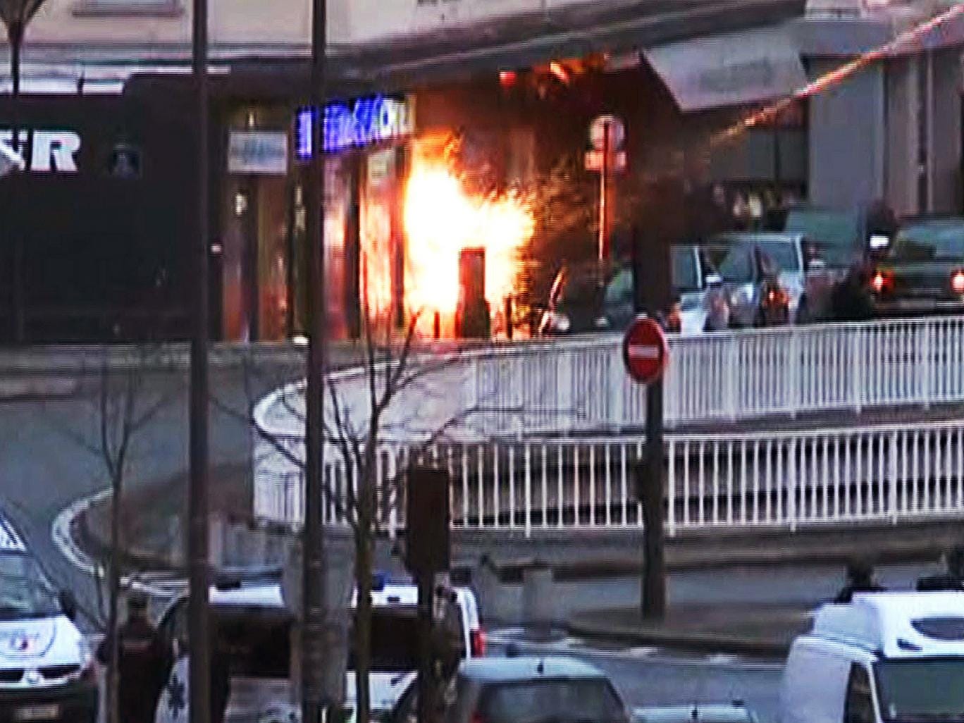 A general view of members of the French police special forces launching the assault at a kosher grocery store in Porte de Vincennes, eastern Paris 