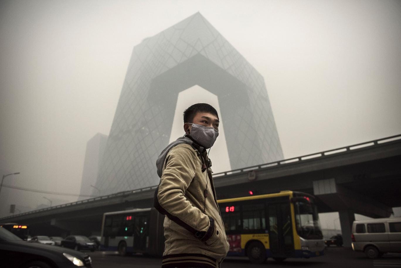 A Chinese man wears a mask to protect from smog in Beijing