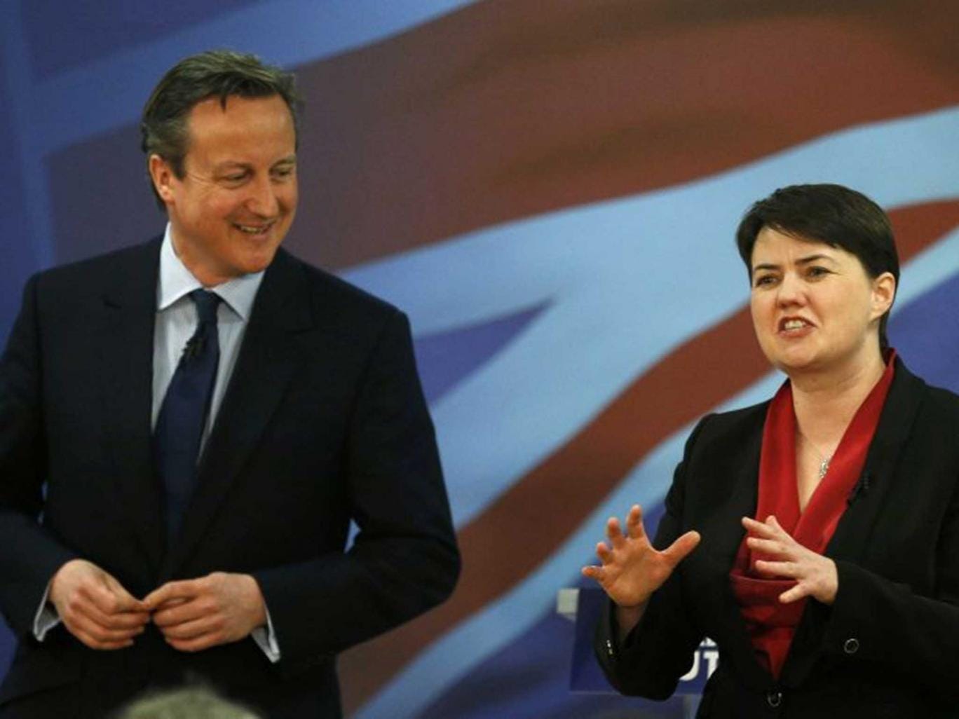 Prime Minister David Cameron listens to Scottish Conservative Leader Ruth Davidson at the launch of the Scottish Conservative manifesto 