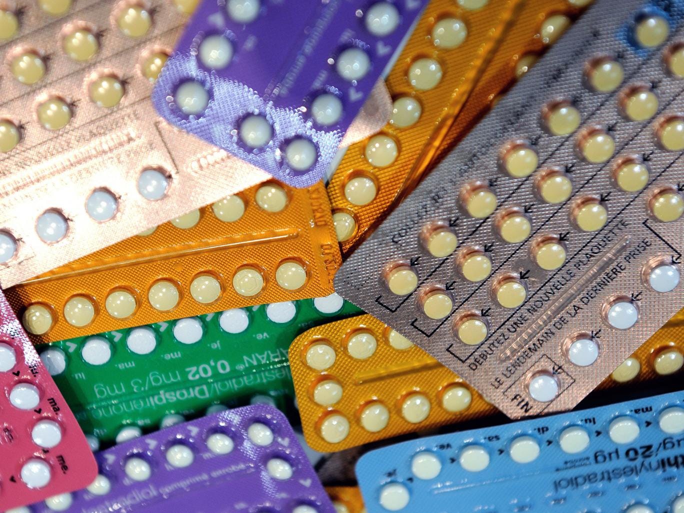 Half of women would consider taking a once-a-month contraceptive pill, according to a new survey, but 'out-dated' abortion laws are holding back development of new kinds of drug
