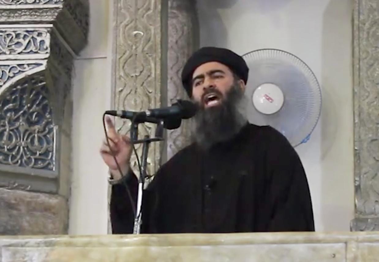 Abu Bakr al-Baghdadi, delivering a sermon at a mosque in Iraq (AP)