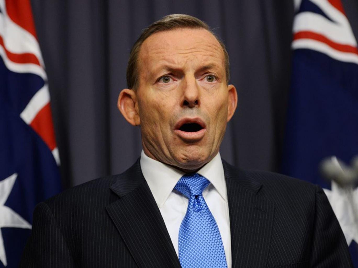 Tony Abbott discussing his departure at a press conference at Parliament House in Canberra, Australia. His two years as Prime Minister were beset by controversy 
