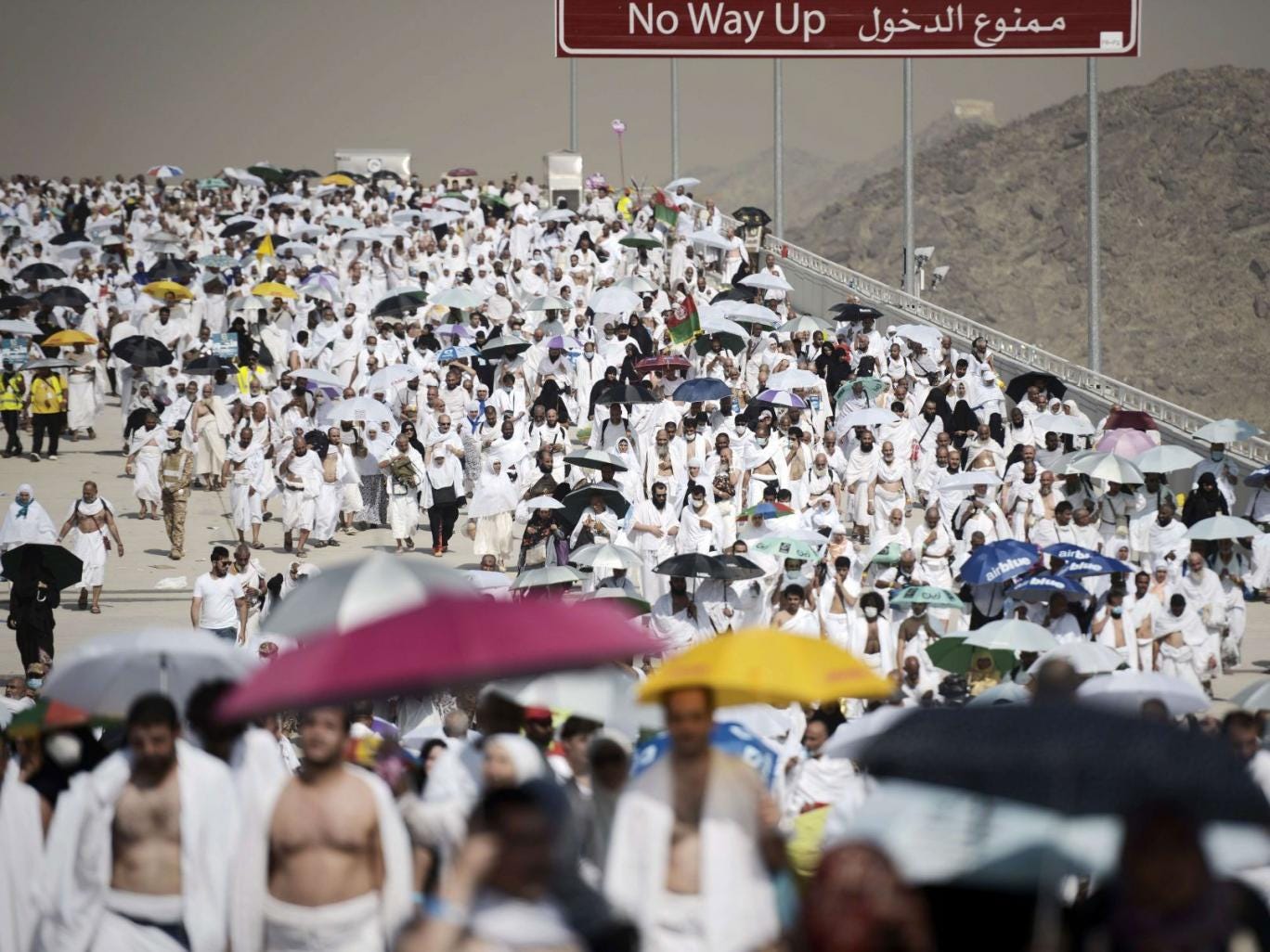 Muslim pilgrims arrive to throw pebbles at pillars during the "Jamarat" ritual, the stoning of Satan, in Mina near the holy city of Mecca, on September 24, 2015. 