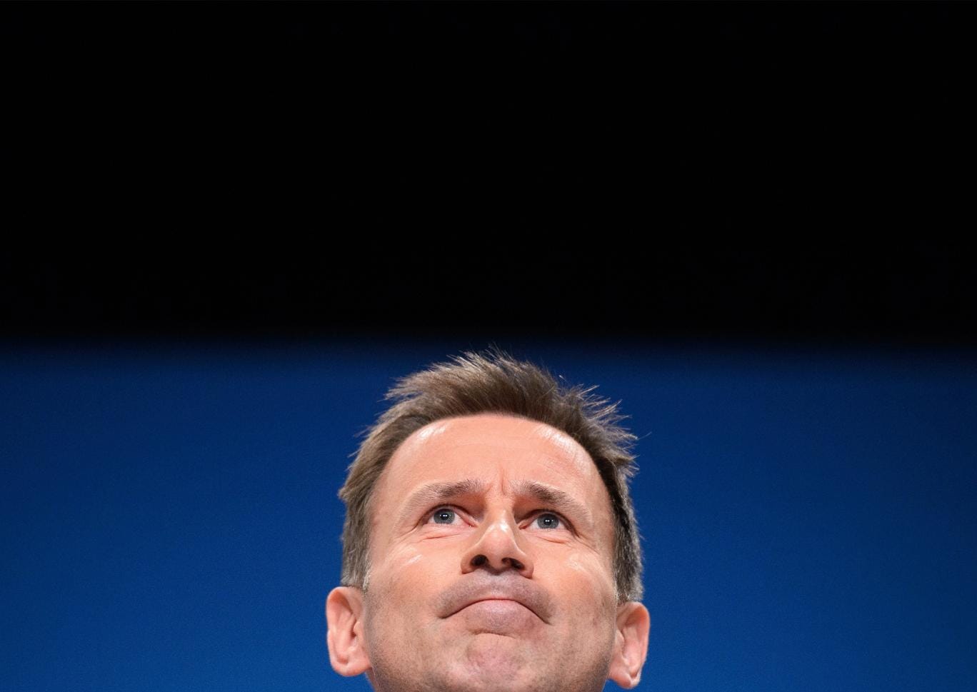 British Health Secretary Jeremy Hunt addresses delegates at the Conservative Party conference in Birmingham in 2014. 