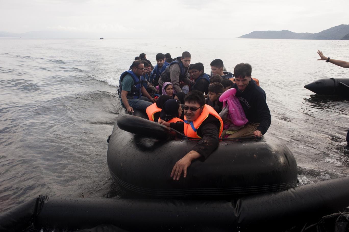Refugees arrive in Lesbos after crossing from Turkey