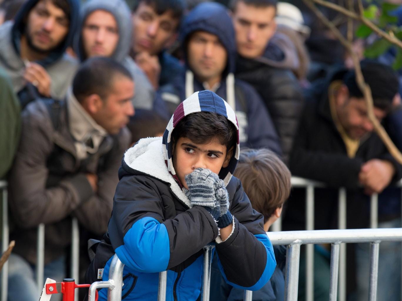 Migrants wait to be processed in Germany