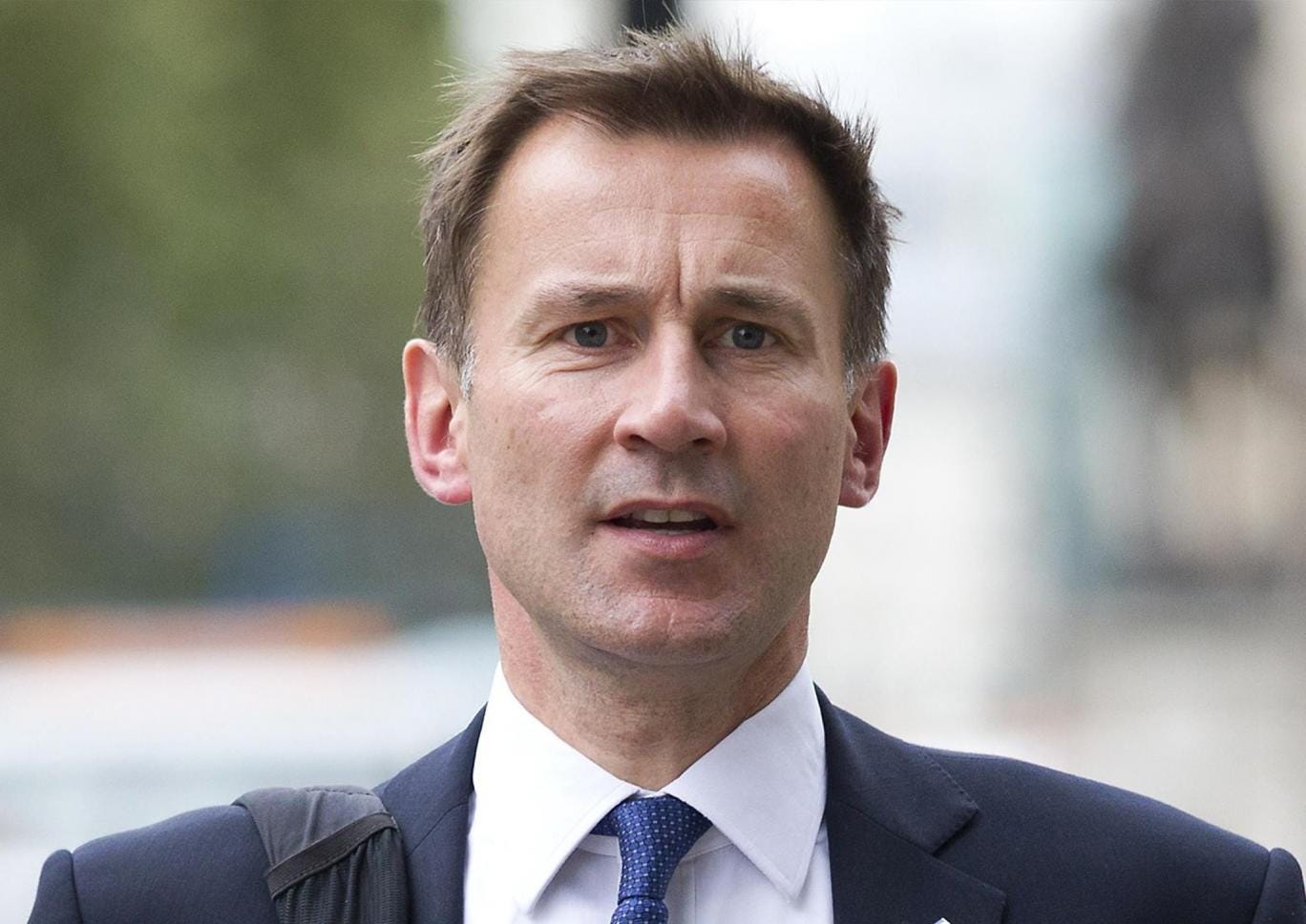 Jeremy Hunt leaves following a COBRA meeting on combating the outbreak of Ebola in West Africa, in central London on October 16, 2014