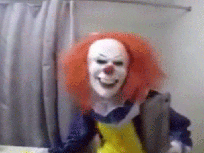 A scary sister dressed as a sinister clown to frighten her older brother