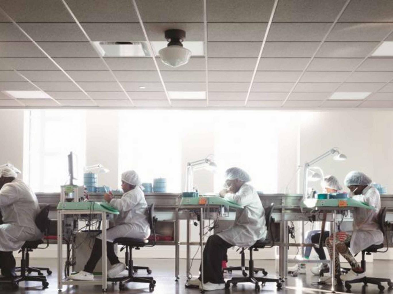 Workers on the Shinola production line
