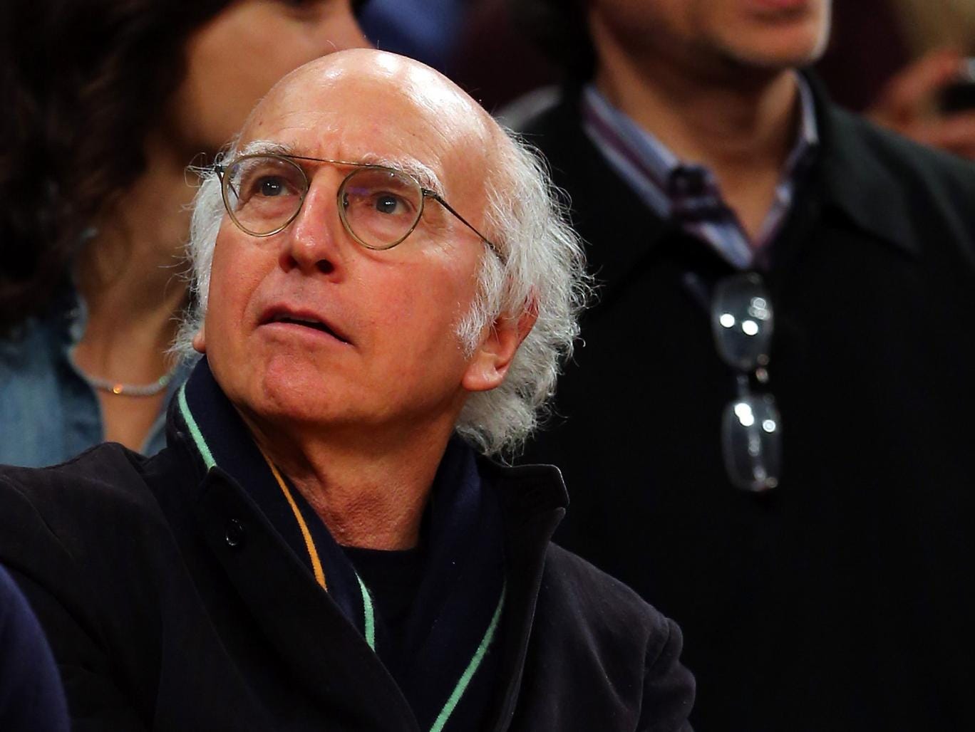 Larry David practices his trademark look at 2012 basketball game