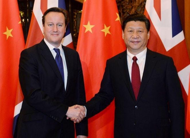 File photo dated 02/12/13 of Prime Minister David Cameron meeting  Xi Jinping in Beijing.