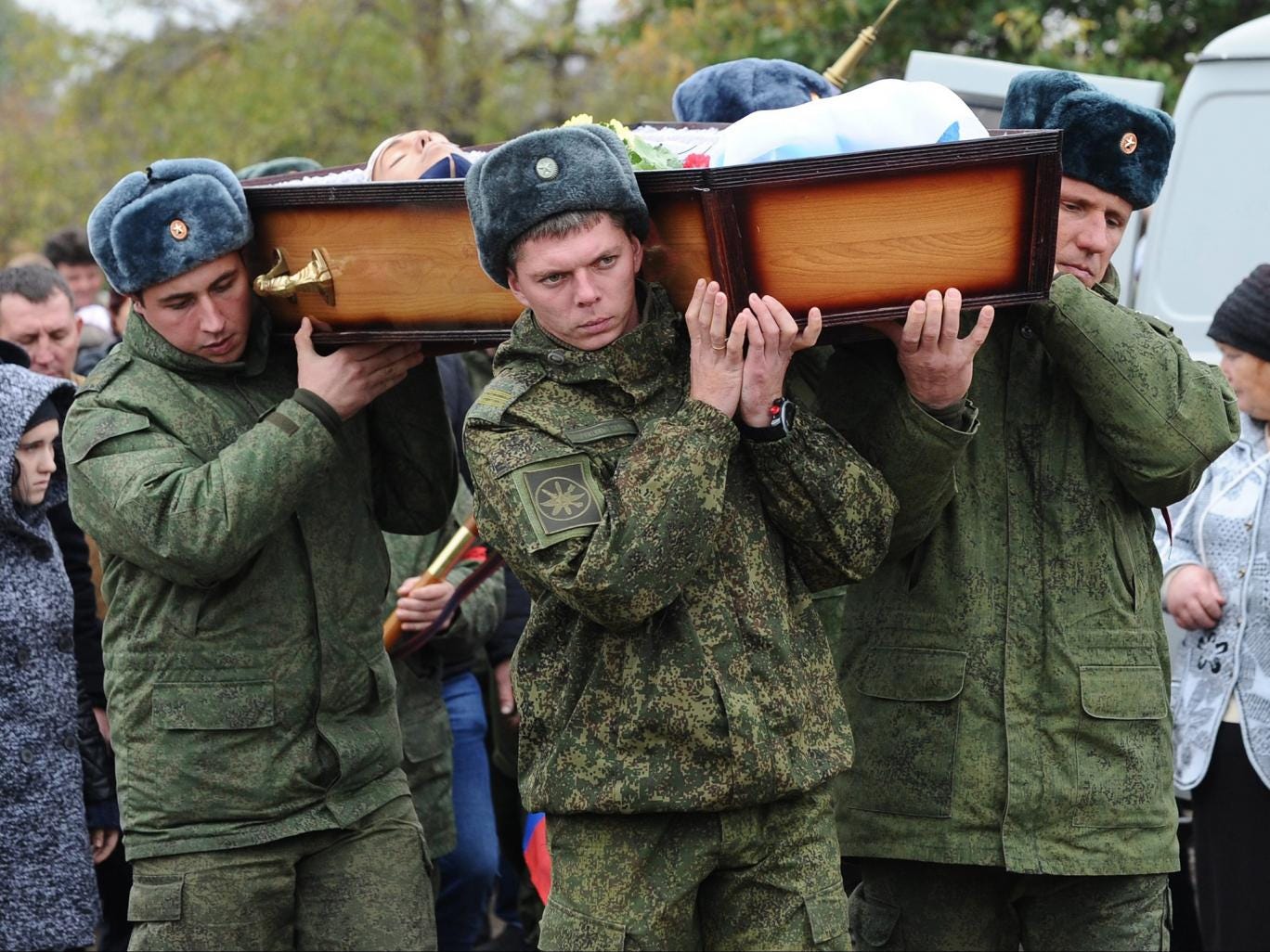 The body of 19-year-old servicemanwas returned to his family in southern Russia on the day of his funeral