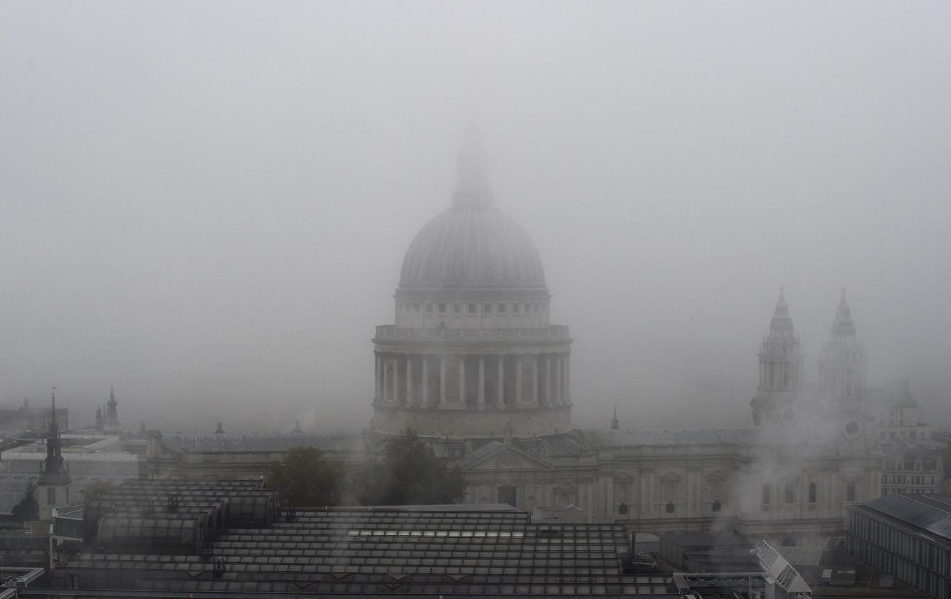 Fog shrouds St Paul's Cathedral in central London
