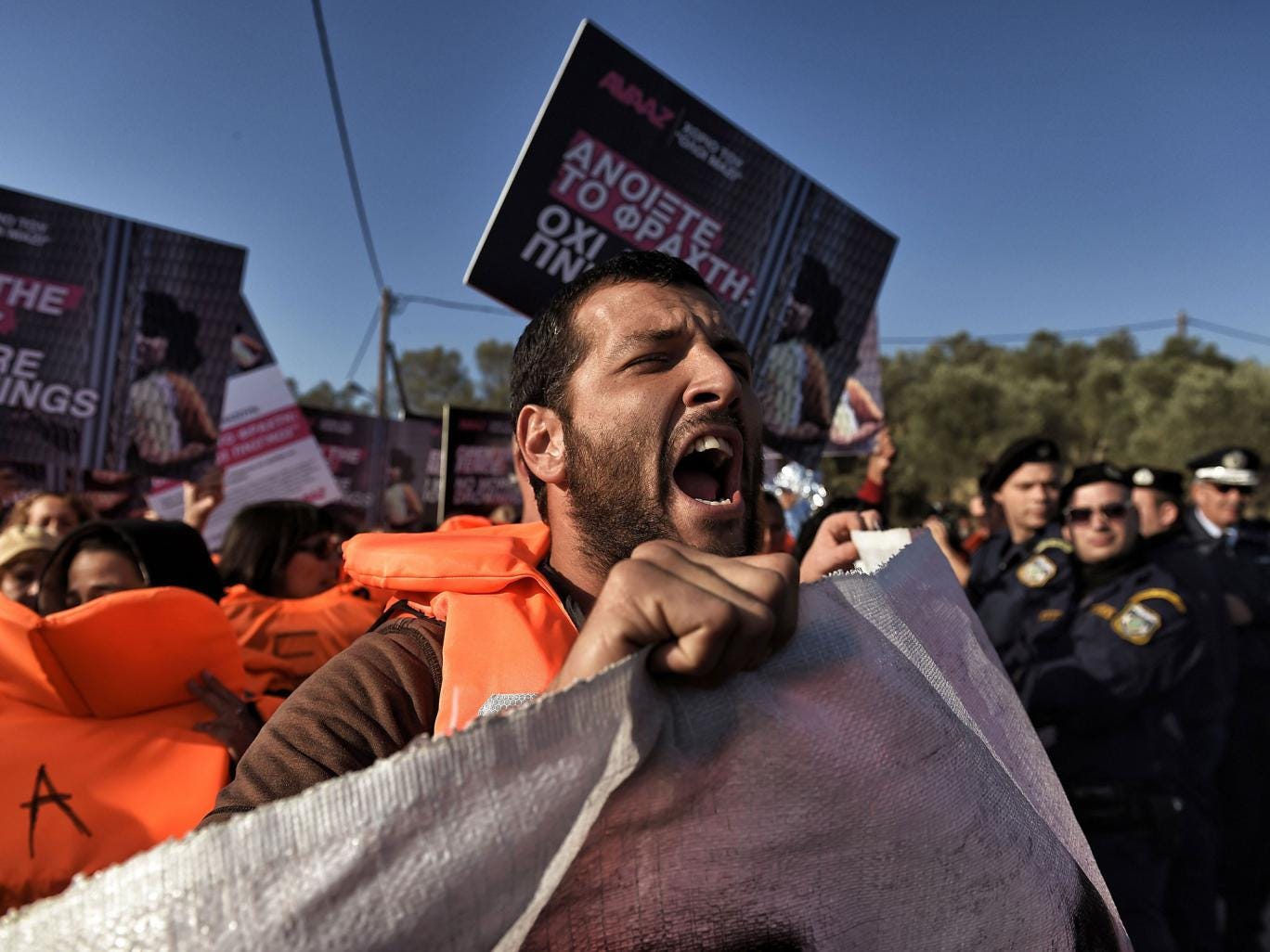 Activists demonstrate during a visit by Greek Prime Minister Alexis Tsipras and European parliament President Martin Schulz to the Moria Hot Spot in Mytilene. Since the start of the Summer, the Greek island of Lesbos has assumed notoriety as the main gate