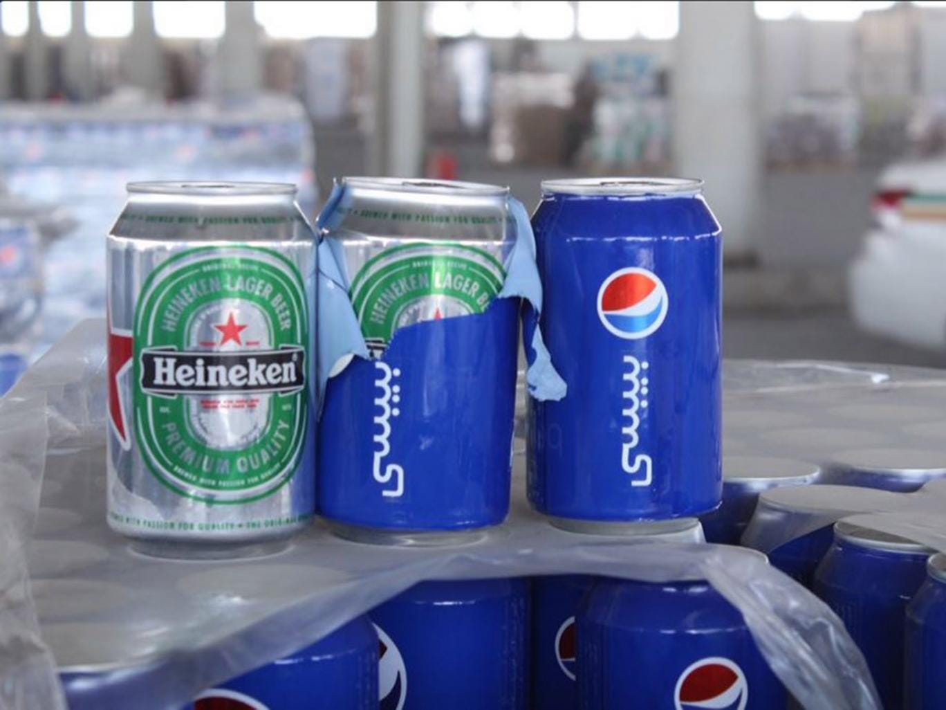 How do you smuggle 48,000 cans of Heineken into Saudi Arabia? Disguise