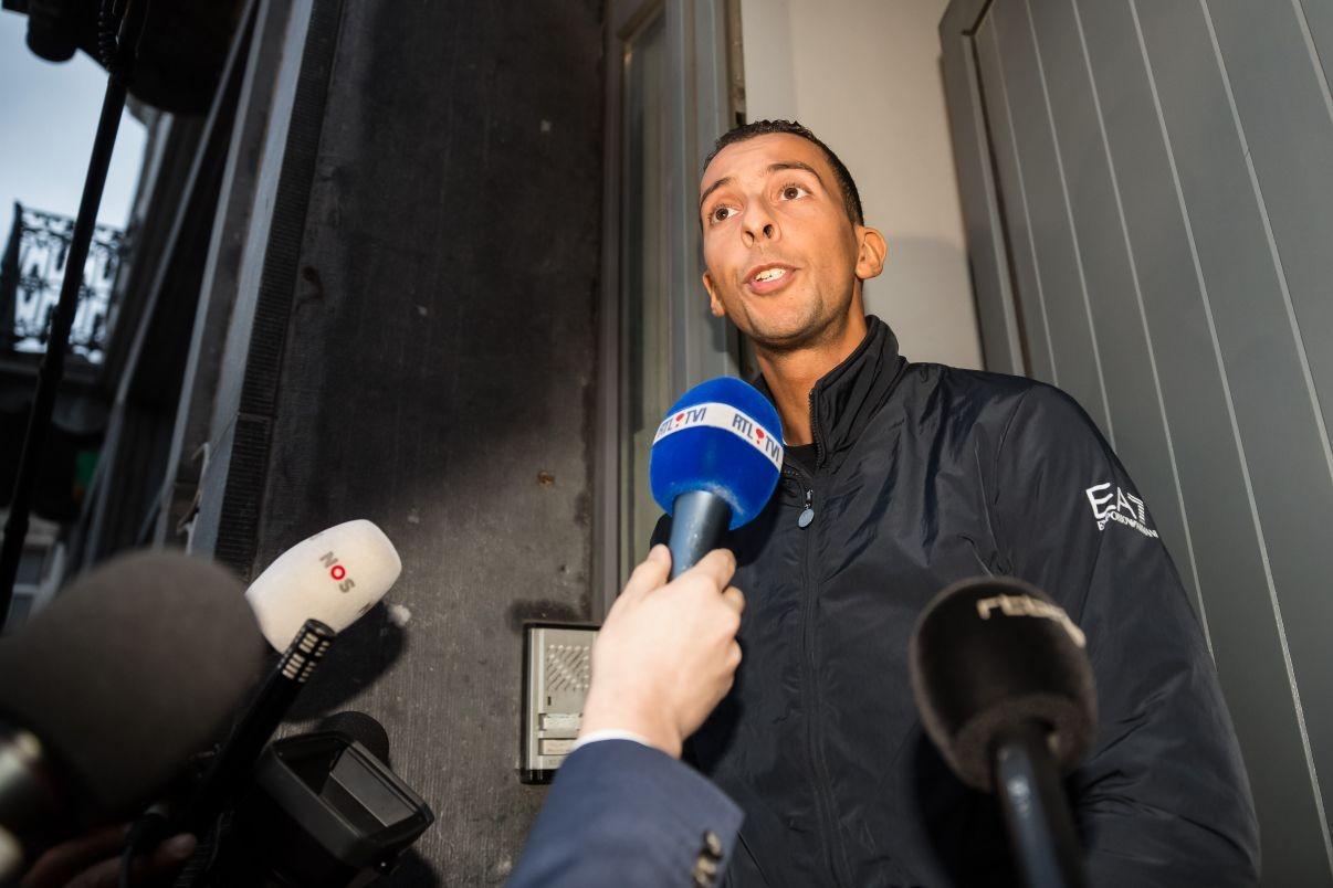 Mohamed Abdeslam, brother of fleeing Paris suspect Salah, speaks to reporters after being released from police custody
