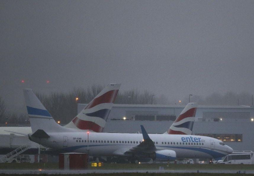 A chartered aircraft taxis after arriving with the first group of Syrian refugees to be accepted by Britain, at Glasgow airport, in Scotland, November 17, 2015. REUTERS/Russell Cheyne
