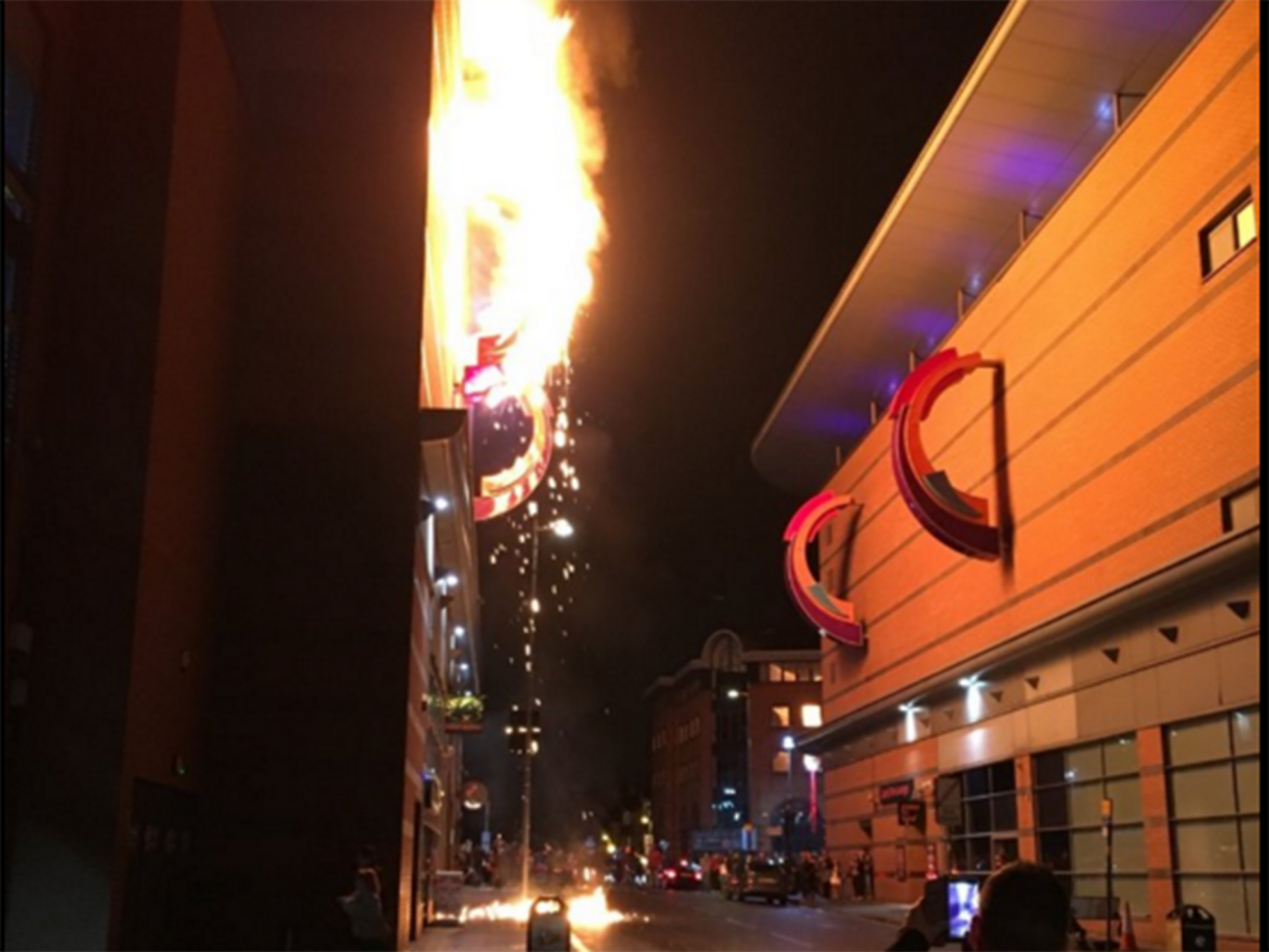 Debris from the sign fell to the pavement below