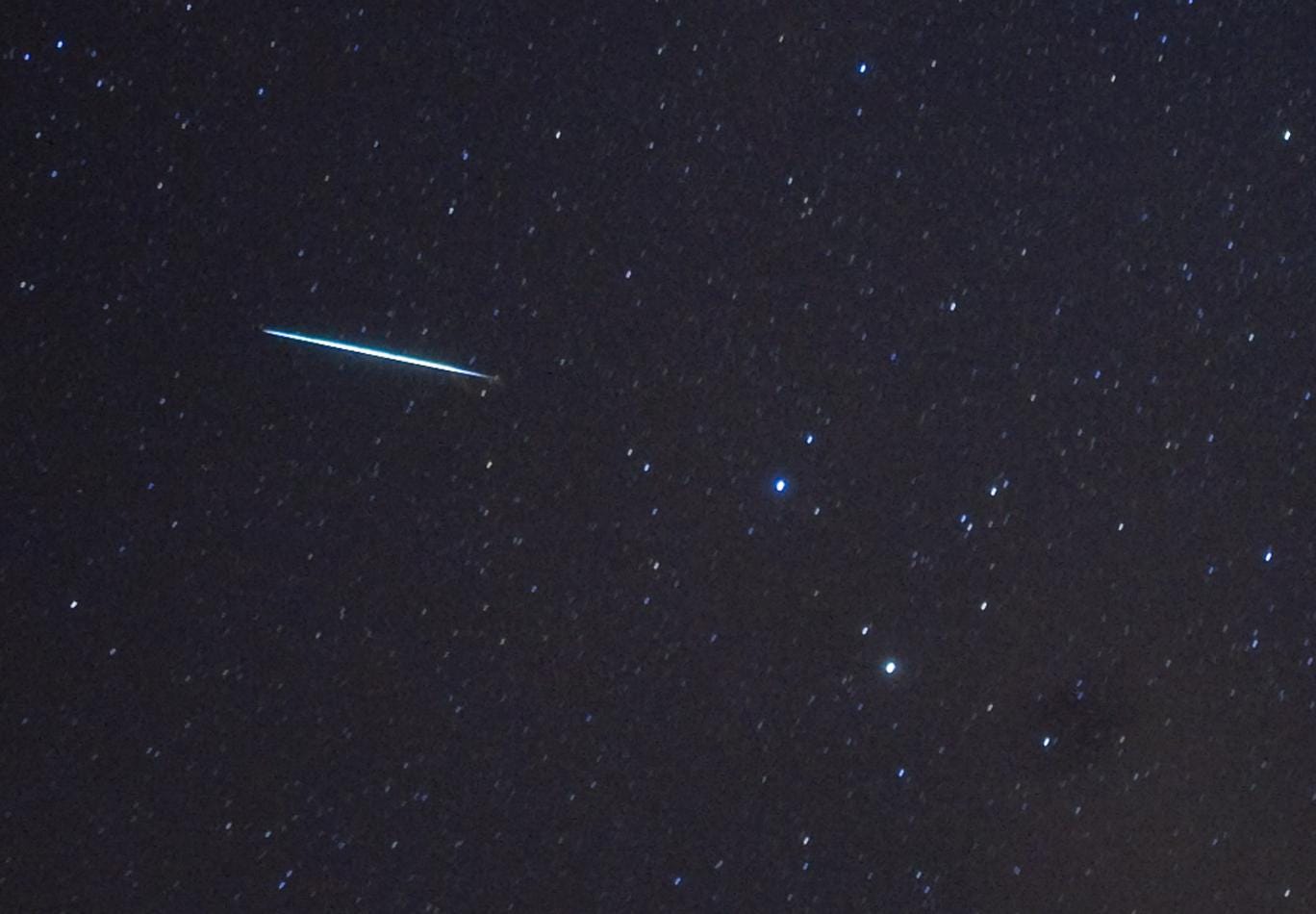 A Geminid meteor enters the Earth's atmosphere above New York